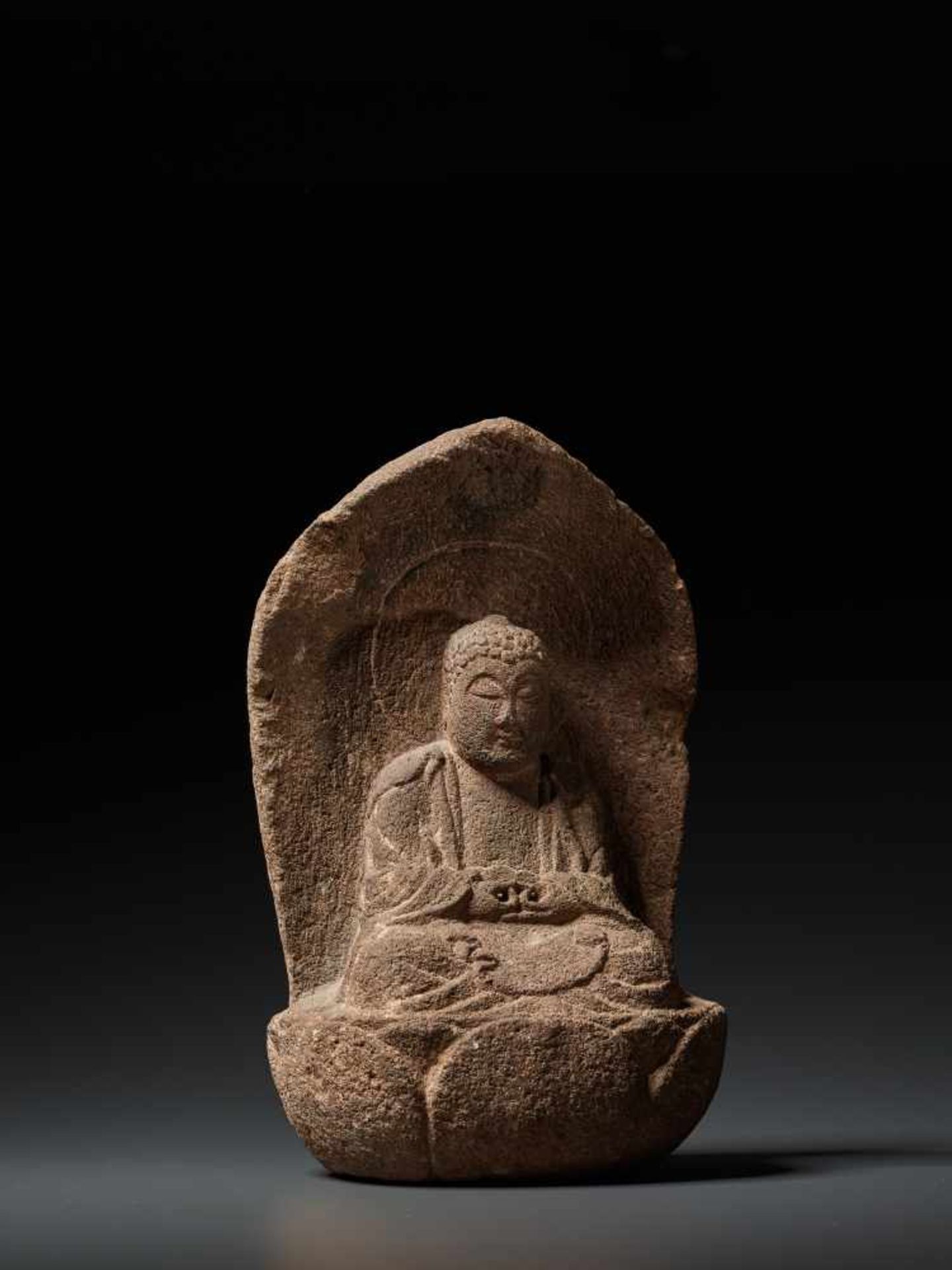 A MUROMACHI PERIOD STONE FIGURE OF BUDDHA AMIDA NYORAI Reddish-grey Sandstone, sculpted Japan, - Image 4 of 7