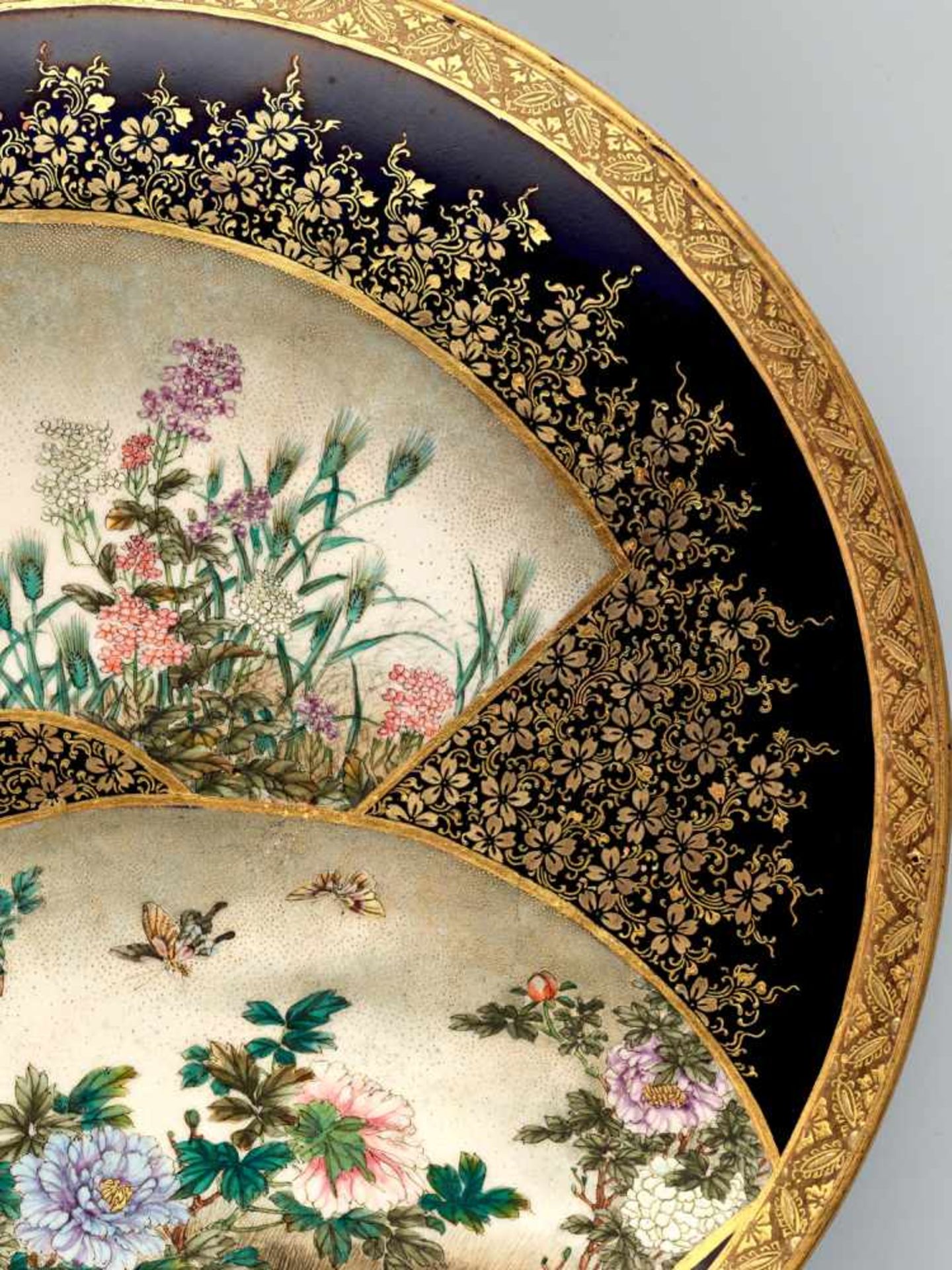 A FINE SATSUMA PLATE BY KINKOZAN DEPICTING BLOSSOMS, BUTTERFLIES AND SPARROWSatsuma ceramicJapan, - Image 4 of 8