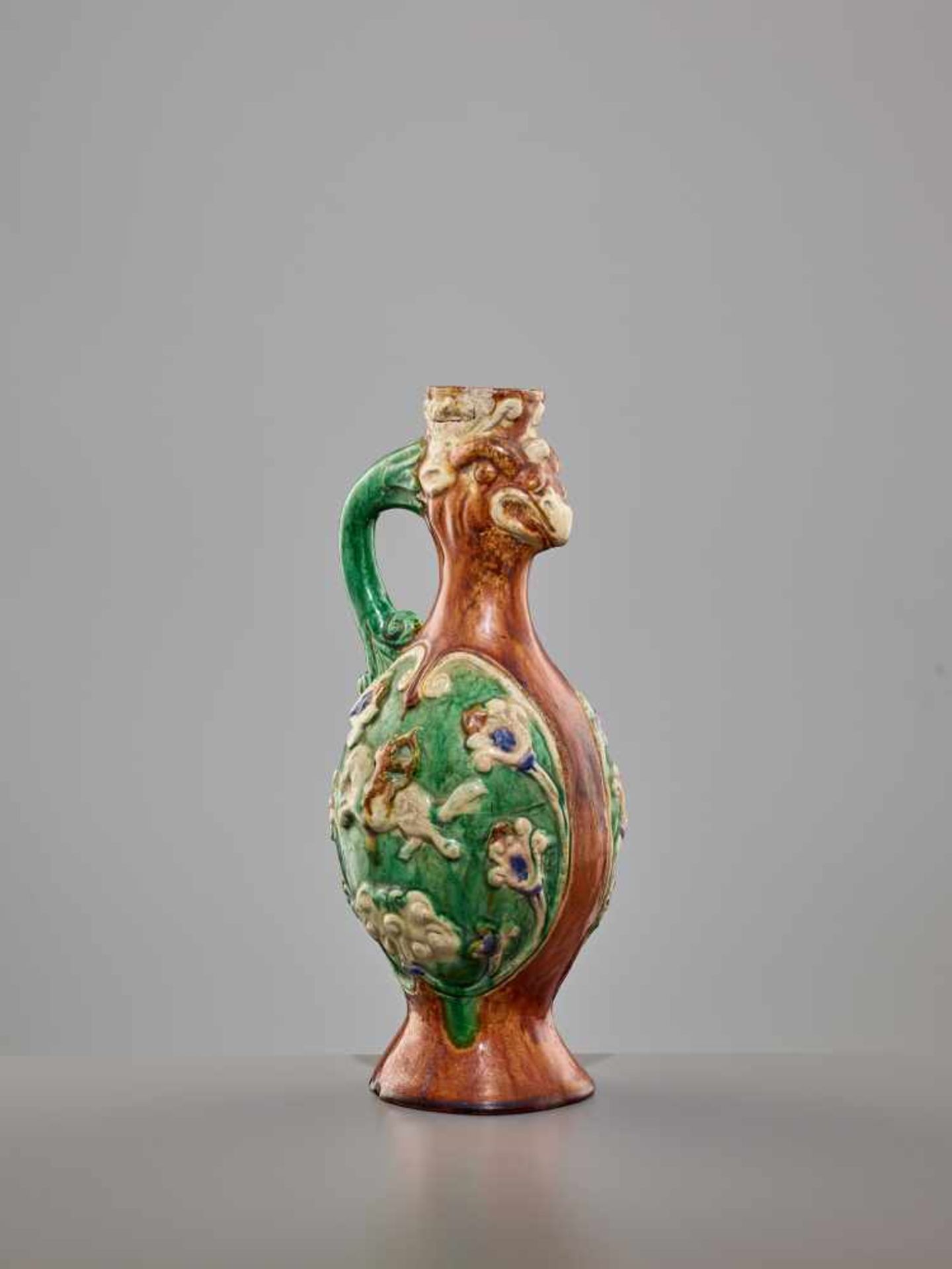 A RARE SANCAI-GLAZED 'PHOENIX' EWER, SONG DYNASTY The finely potted body of elegant ovoid form, - Image 4 of 10