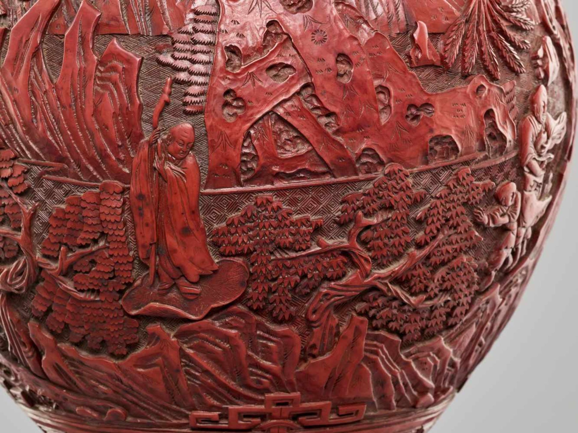 A LARGE PAIR OF CINNABAR LACQUER ‘EIGHT IMMORTALS’ VASES, QING DYNASTYThe body entirely covered with - Image 13 of 26