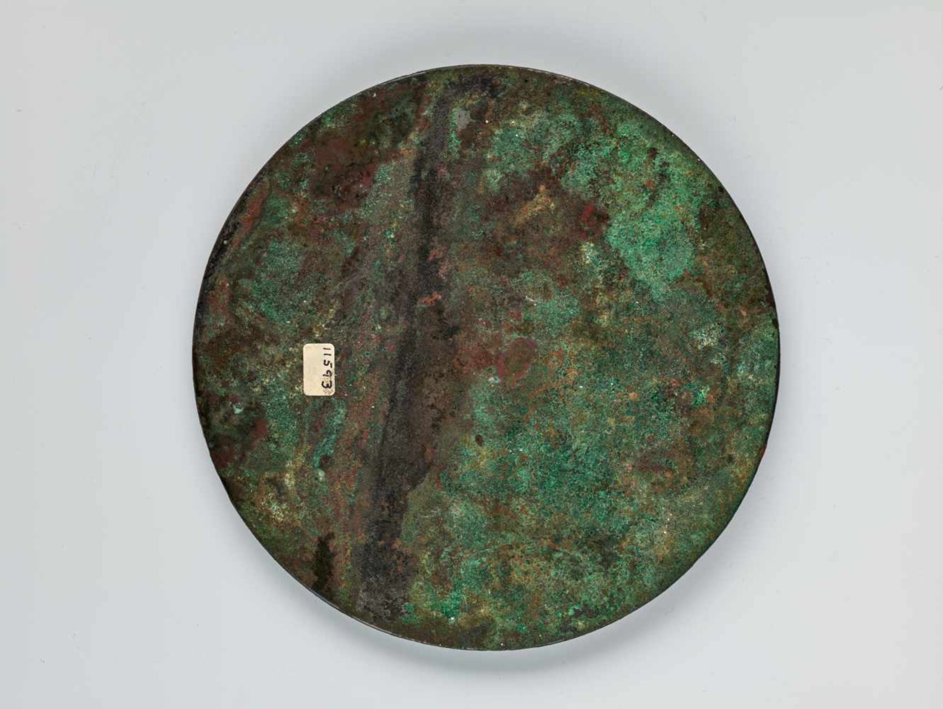 A LARGE INSCRIBED 'TLV' BRONZE MIRROR, HAN DYNASTYCast bronze with high relief, the patina with - Image 2 of 6