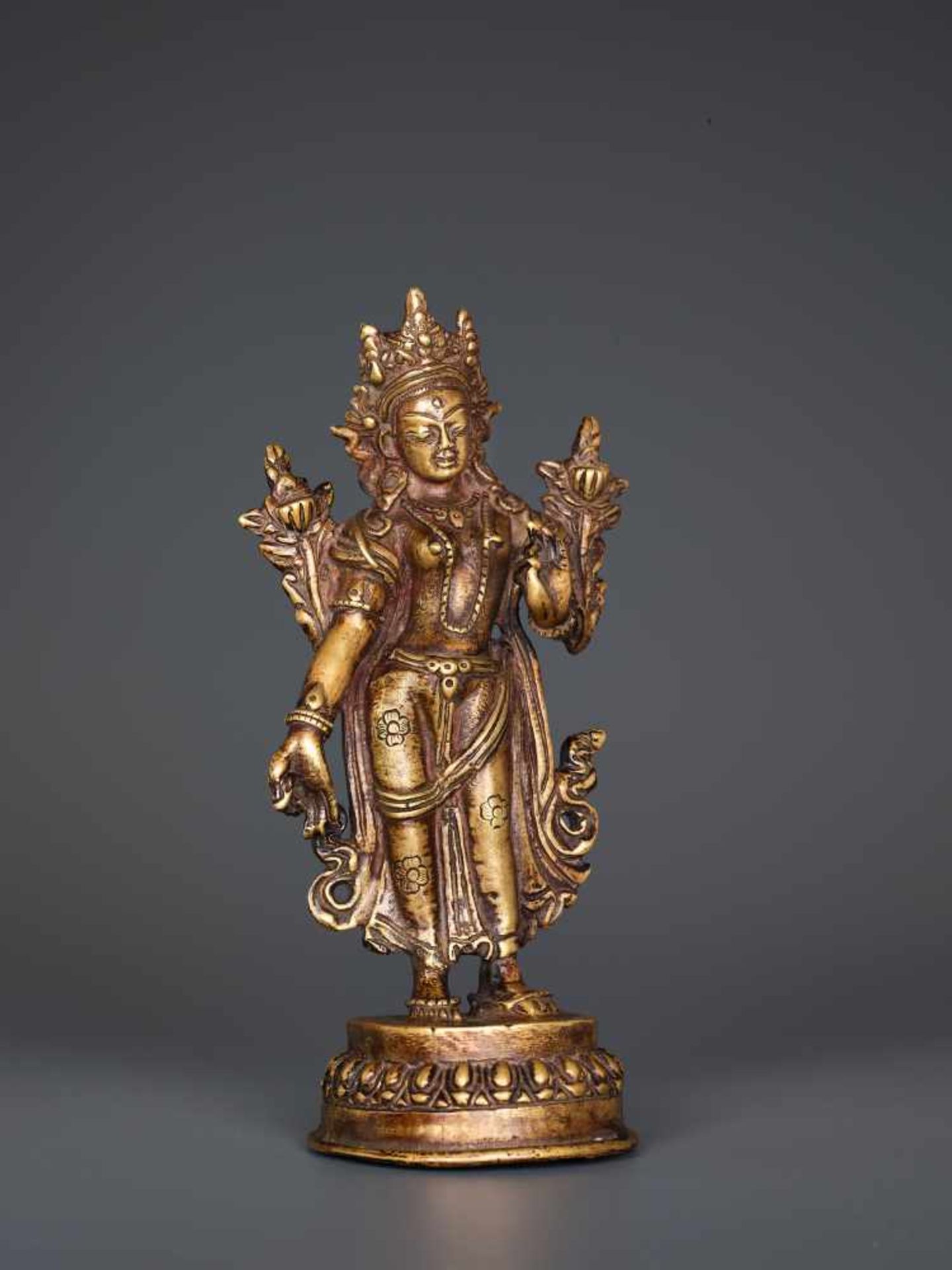 A BRONZE FIGURE OF TARA STANDING IN TRIBHANGA, TIBET, 19th CENTURY Cast and chased bronze, sealed - Image 3 of 7