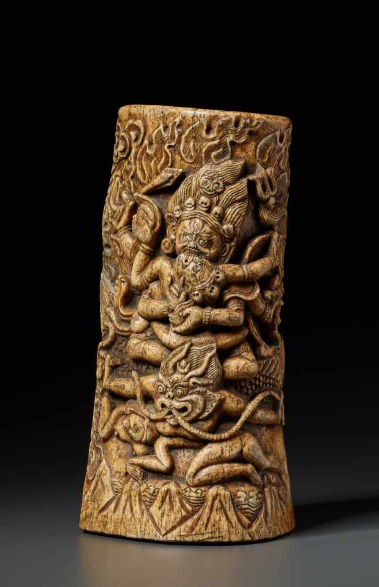 A VERY LARGE TANTRIC BONE CARVING WITH MAHAKALA AND VAJRAYOGINI, 17th – 18th CENTURYBone with