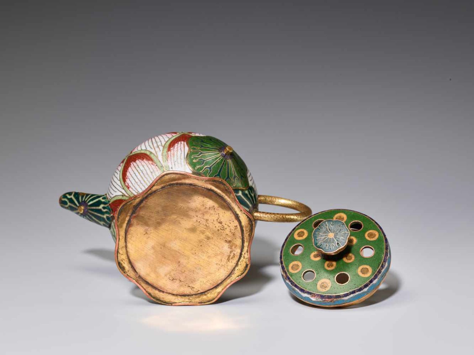 A EXTREMELY RARE CLOISONNE ENAMEL LOTUS-LEAF FORM EWER, 18TH CENTURYFire gilt and incised bronze, - Image 9 of 11
