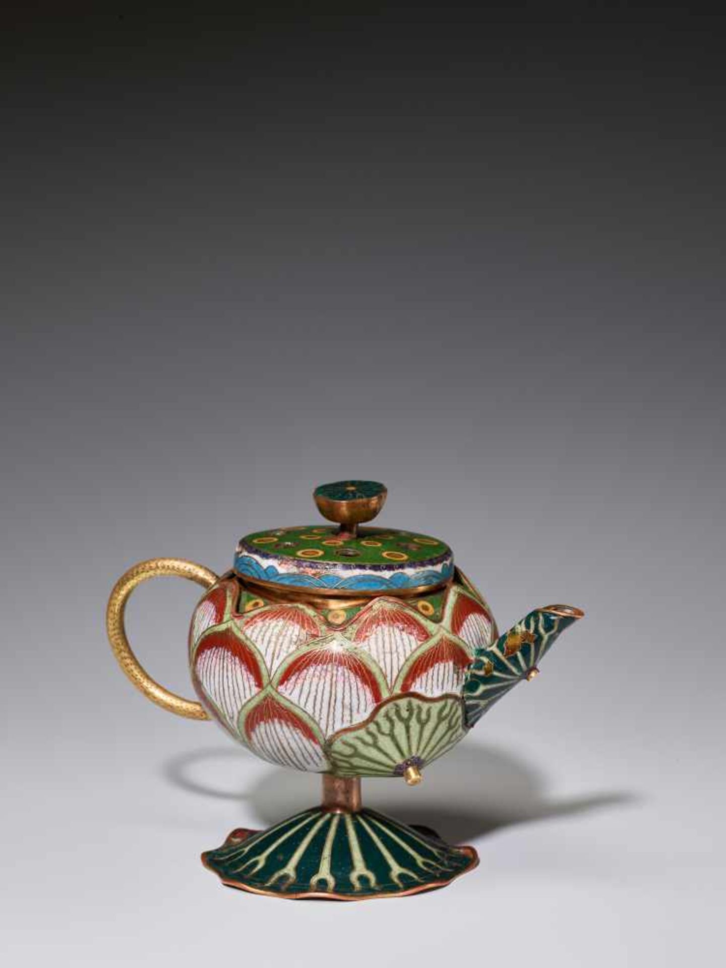 A EXTREMELY RARE CLOISONNE ENAMEL LOTUS-LEAF FORM EWER, 18TH CENTURYFire gilt and incised bronze,
