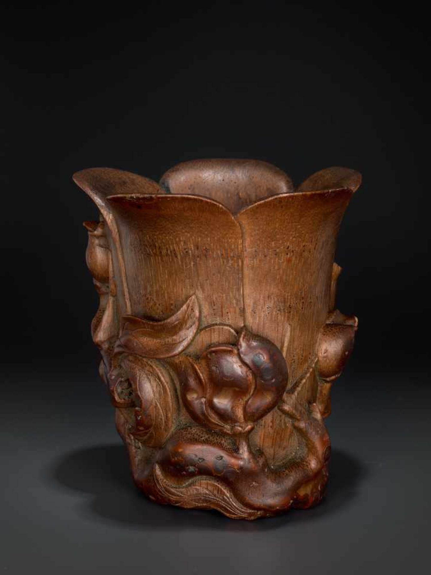 A CARVED KANGXI PERIOD BAMBOO ‘MAGNOLIA’ LIBATION CUP Bamboo, black lacquer China, Kangxi period ( - Image 4 of 7