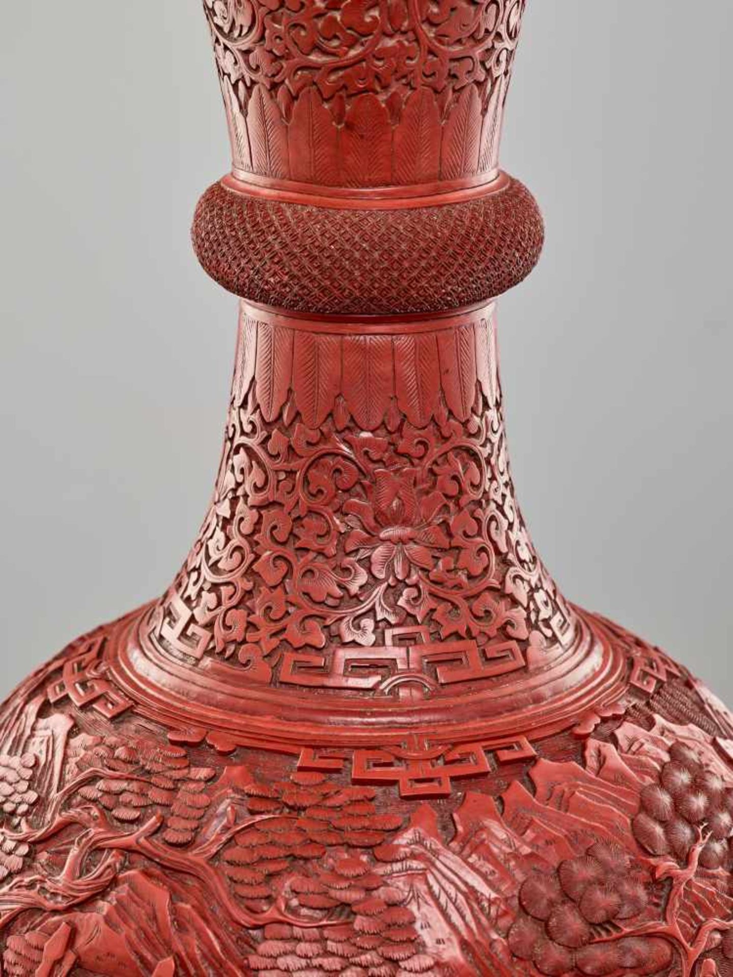 A LARGE PAIR OF CINNABAR LACQUER ‘EIGHT IMMORTALS’ VASES, QING DYNASTYThe body entirely covered with - Image 24 of 26