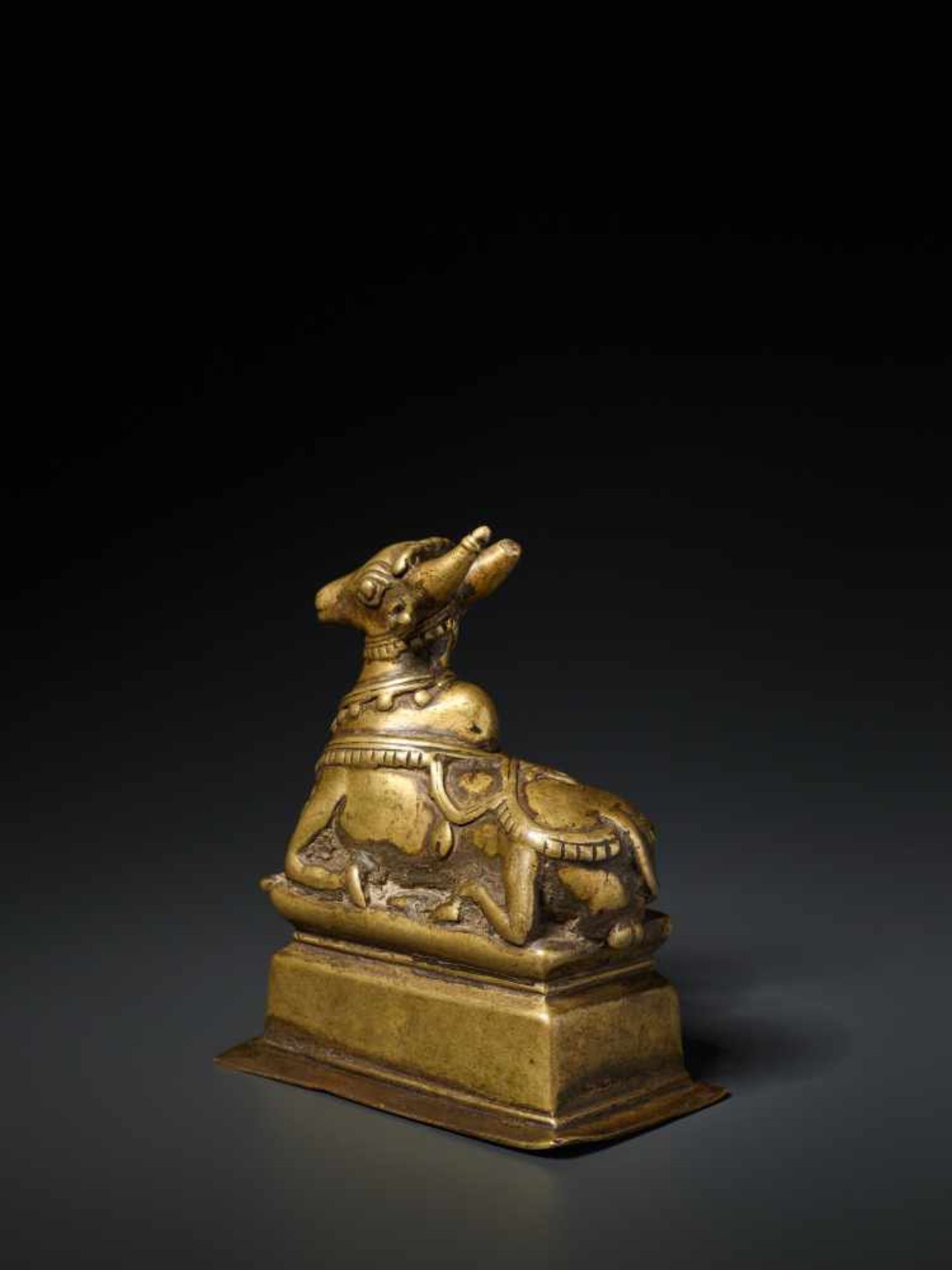 AN INDIAN BRASS FIGURE OF NANDI, 15th CENTURY Brass India, Himachal Pradesh, 15th century Nandi is - Image 3 of 7