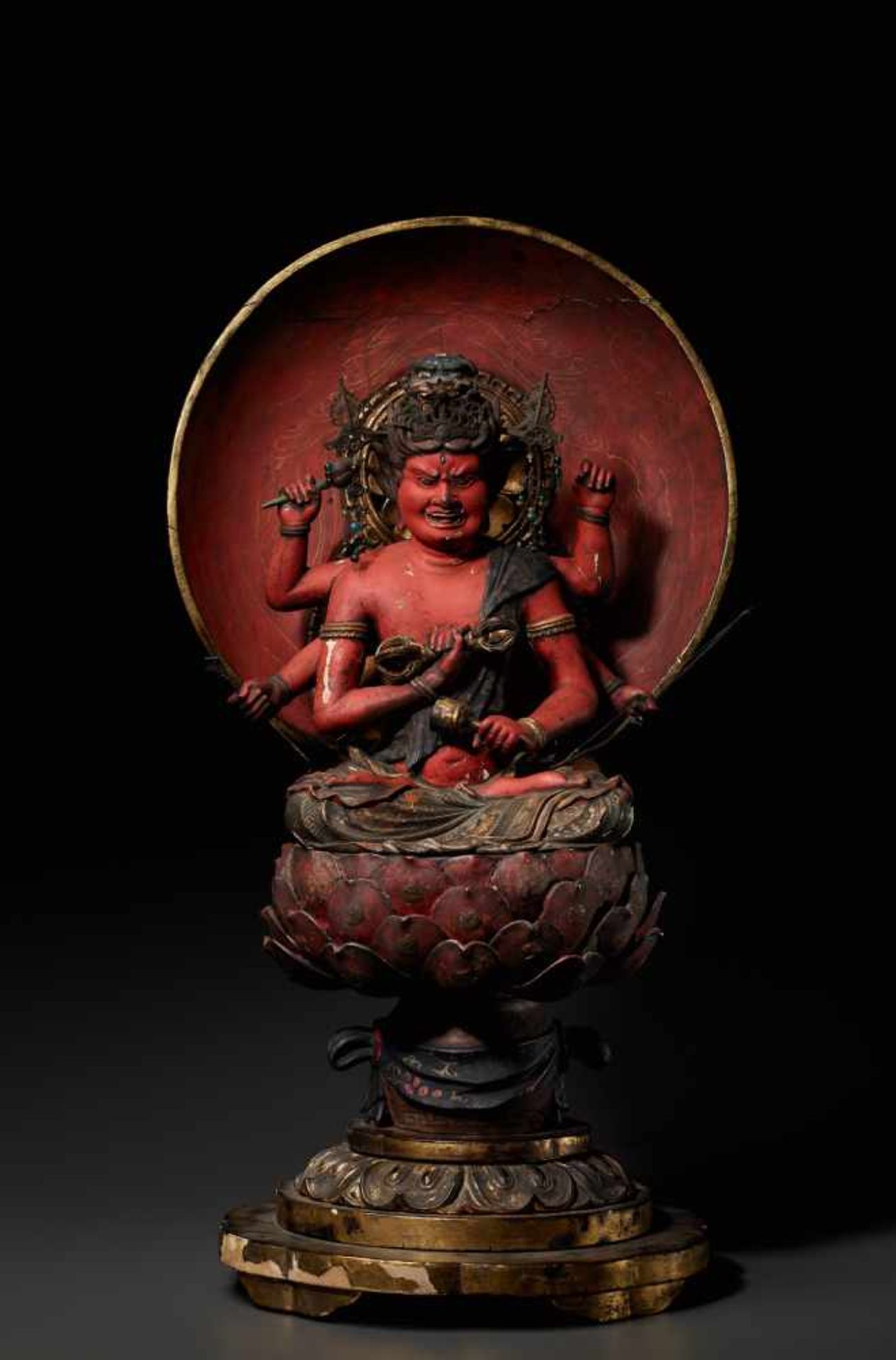 AN IMPORTANT GILT AND POLYCHROMED WOOD FIGURE OF AIZEN MYO-O, MUROMACHI PERIOD (1333-1573)Gilt and