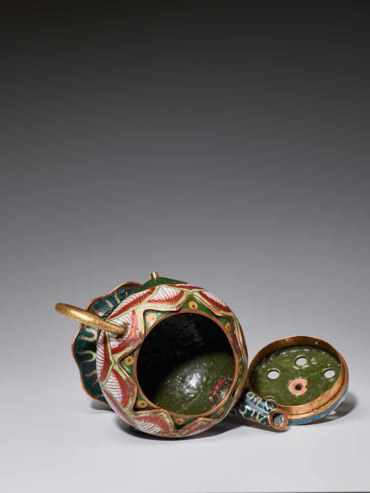 A EXTREMELY RARE CLOISONNE ENAMEL LOTUS-LEAF FORM EWER, 18TH CENTURYFire gilt and incised bronze, - Image 6 of 11