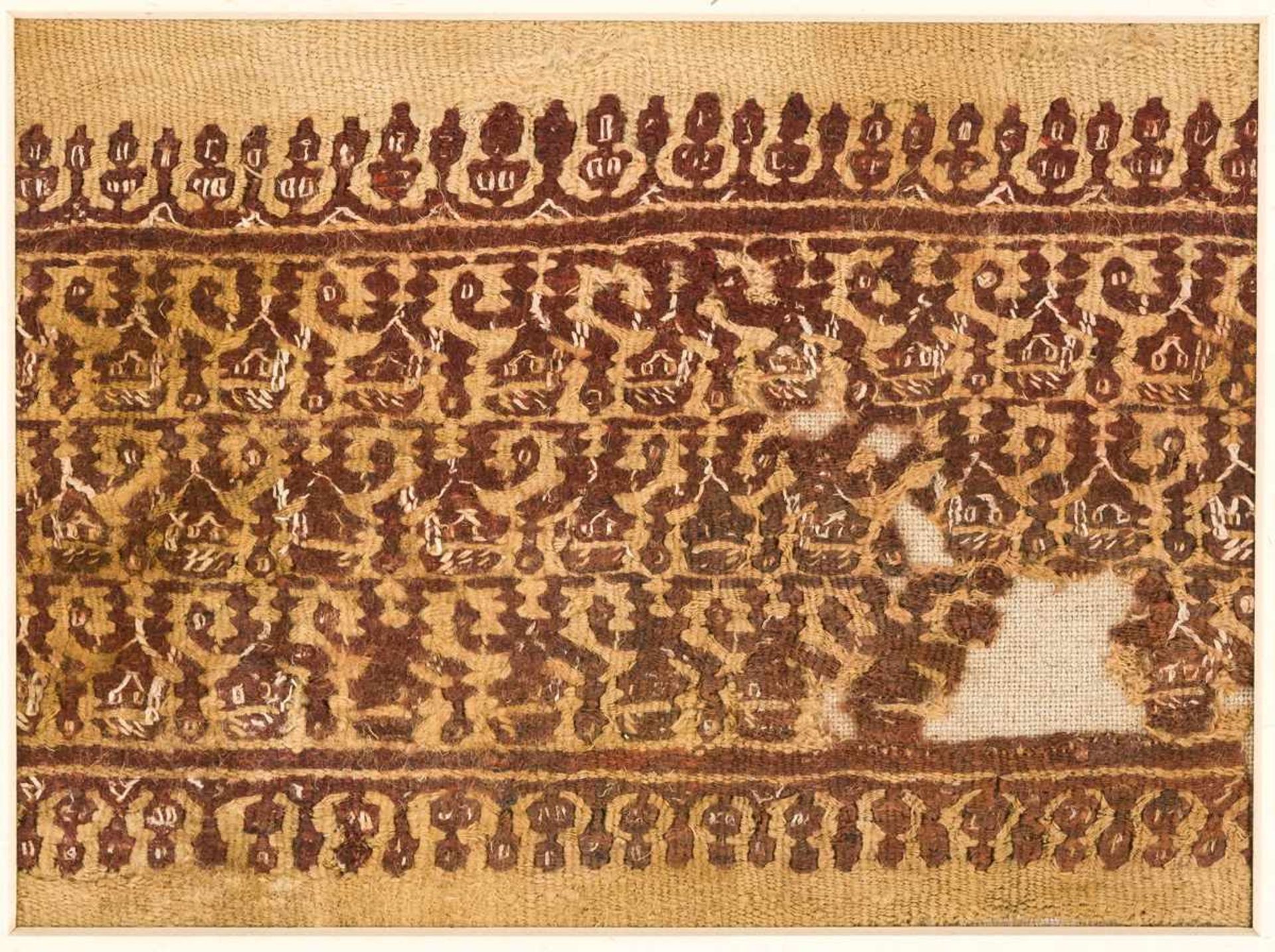 Koptisches TextilfragmentWirkerei, Leinen / Wolle, wohl 3.-8. Jh.ca. 19,2 x 25,5cmProvenienz: