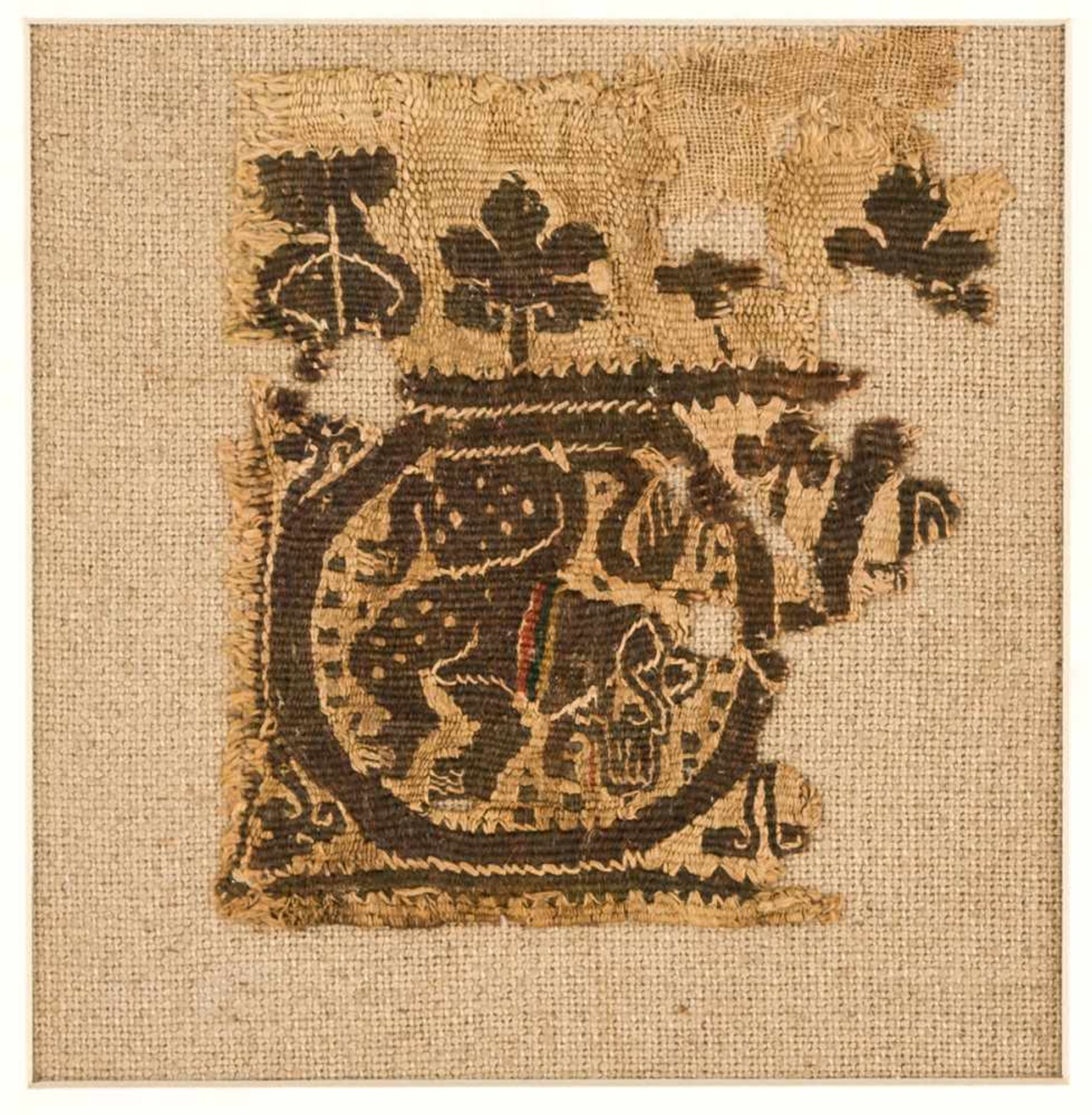 Koptisches Textilfragment Wirkerei, Leinen / Wolle, wohl 3.-8. Jh. ca. 12,3 x 9,5 cmProvenienz:
