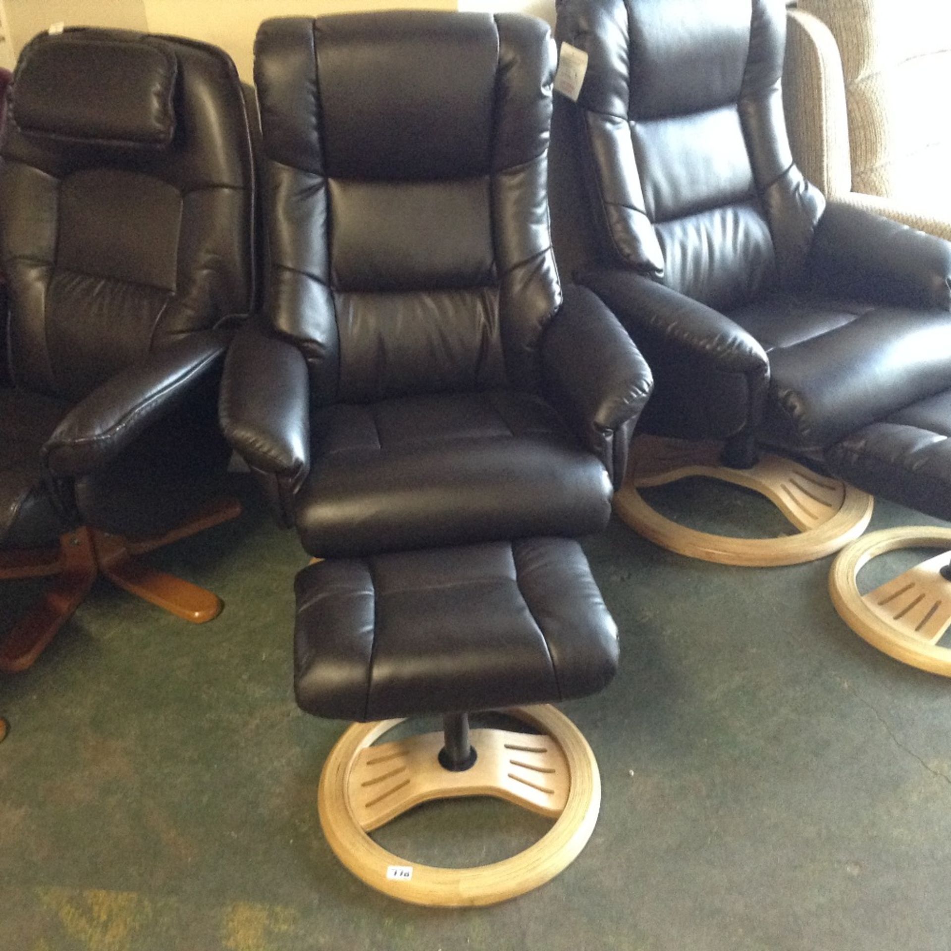 MANDALAY BROWN LEATHER RECLINING CHAIR AND FOOTSTOOL (2)