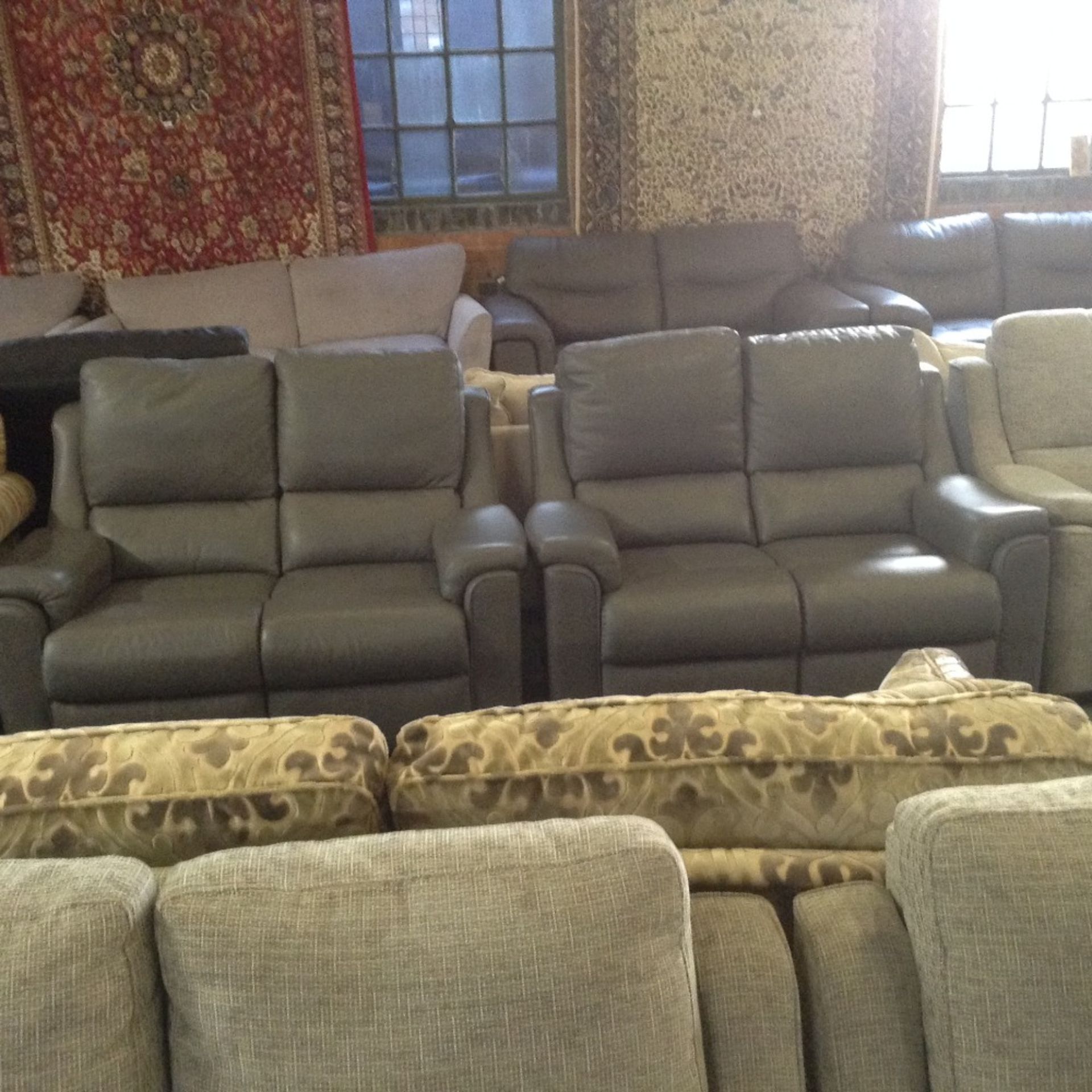 2 X GREY LEATHER TWO SEATER SOFAS (TROO1041-WOOO65