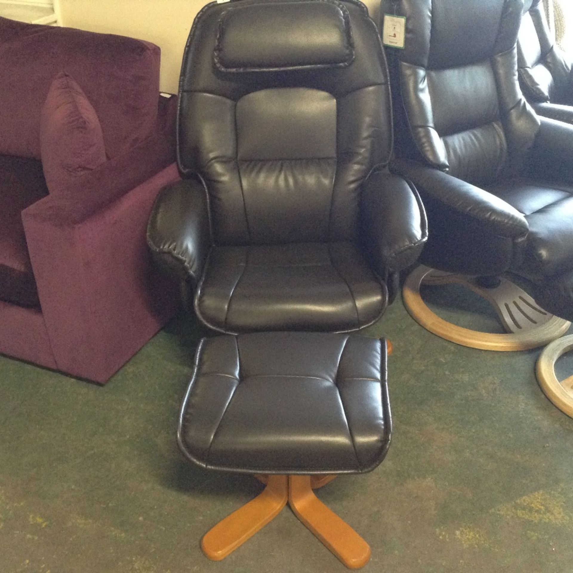 AVANTI BROWN LEATHER RECLINING CHAIR AND FOOTSTOOL