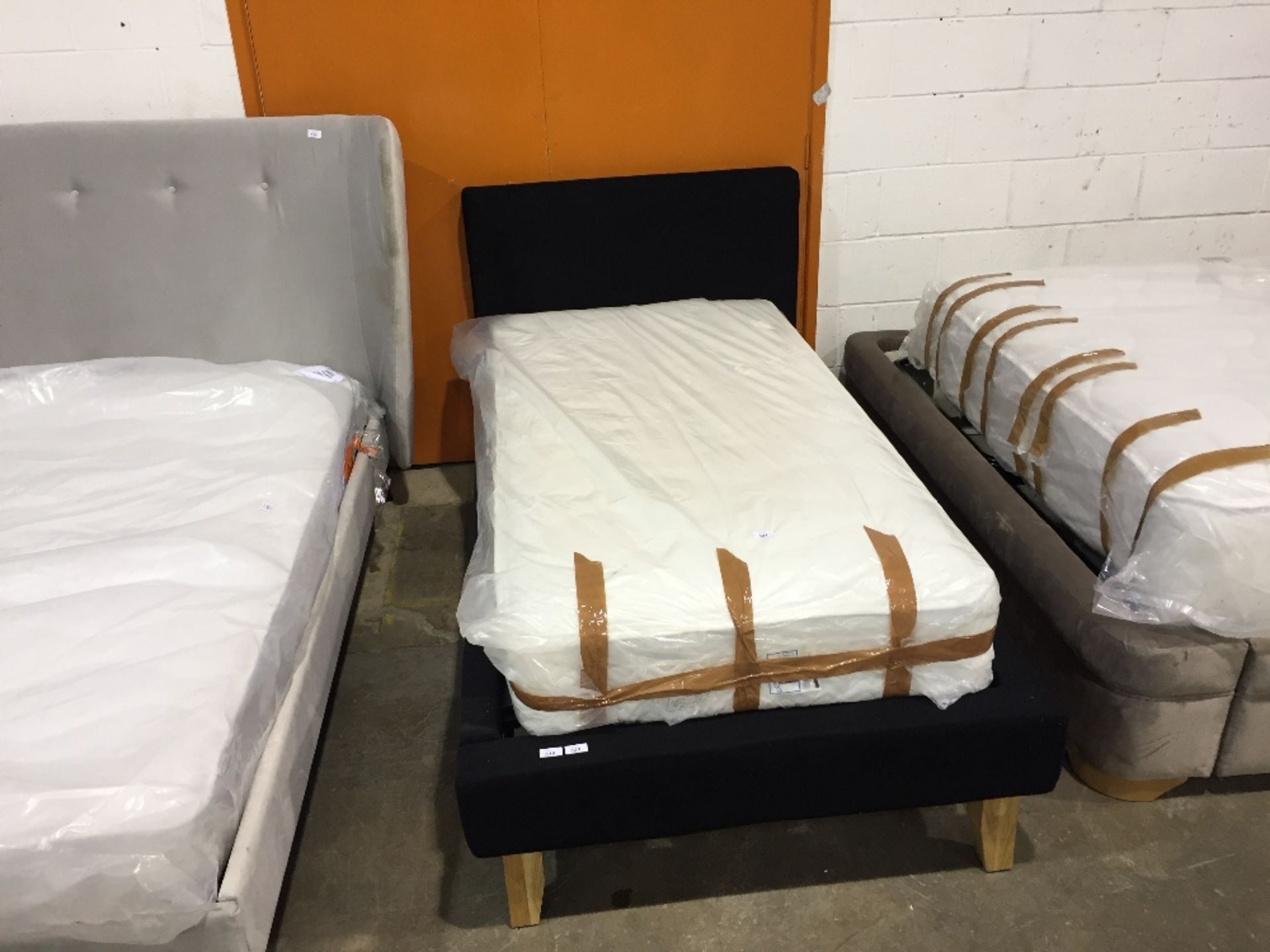BLACK UPHOLSTERED SINGLE BEDFRAME (unsure if complete boxed)
