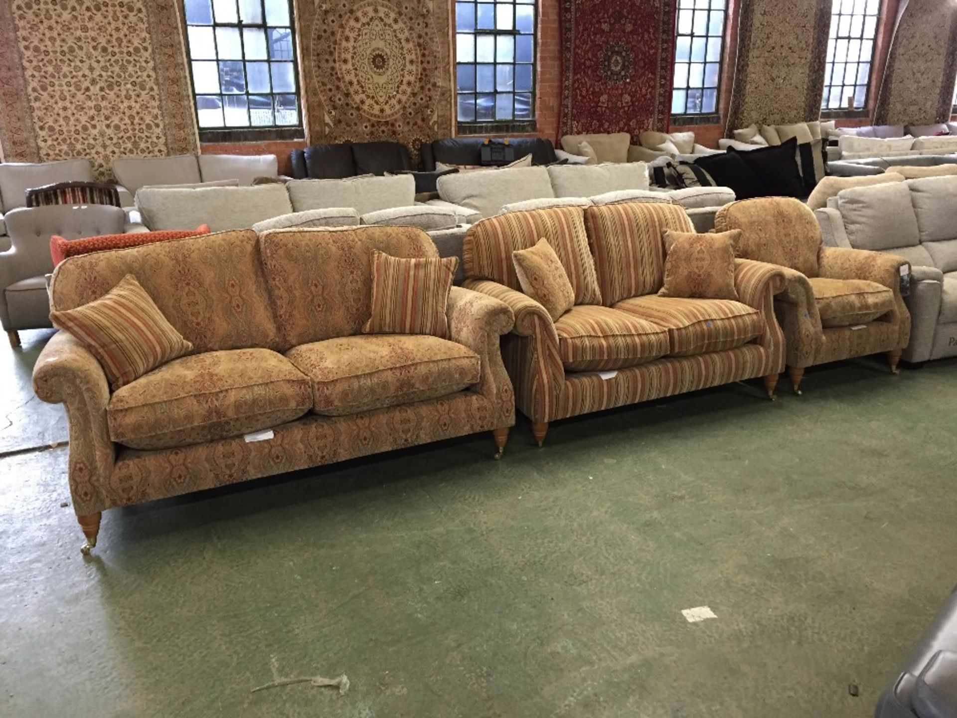 GOLDEN FLORAL PATTERNED 3 SEATER SOFA CHAIR AND MULTI COLOURED STRIPED 2 SEATER SOFA (missing wheel