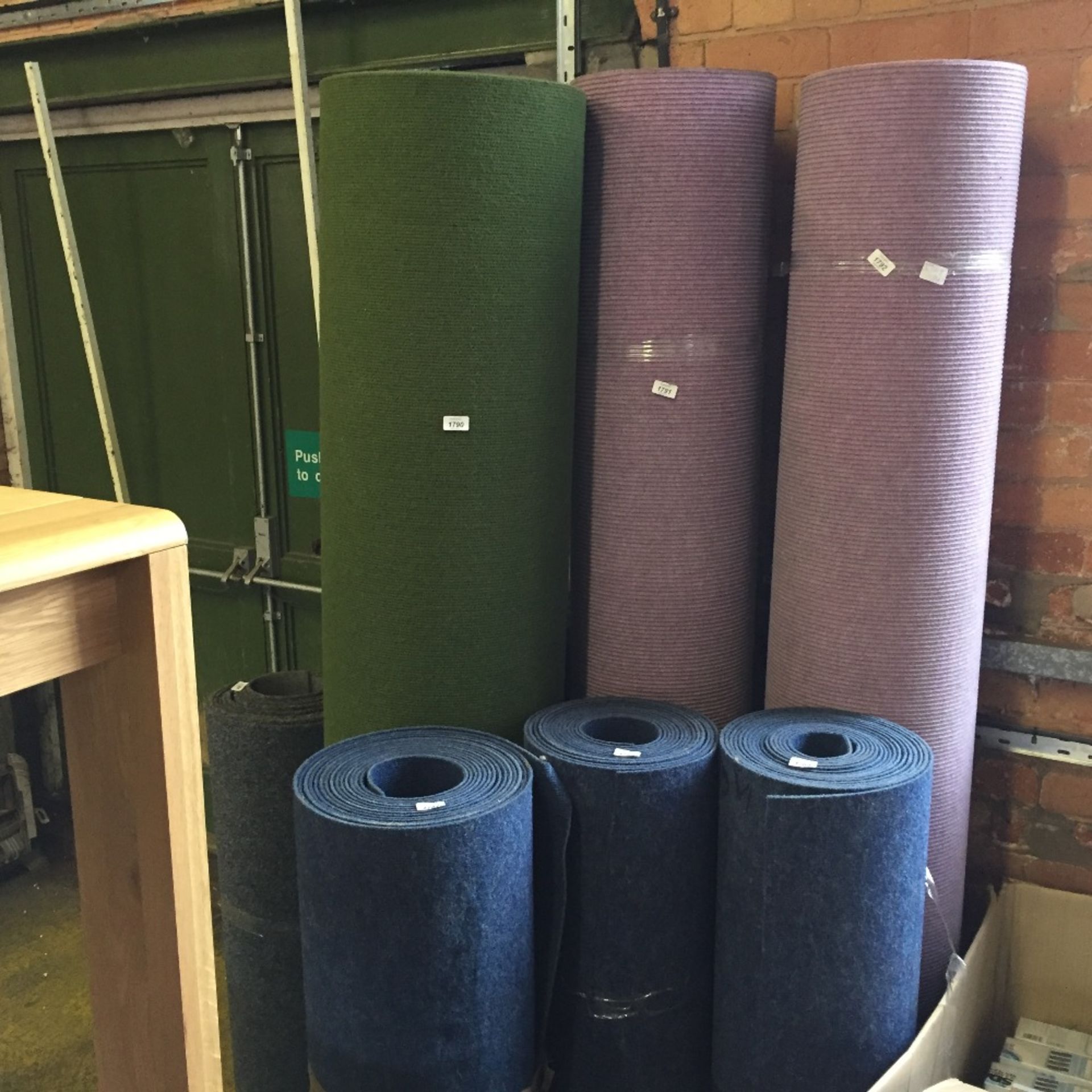 LARGE GREEN ROLL OF CARPET