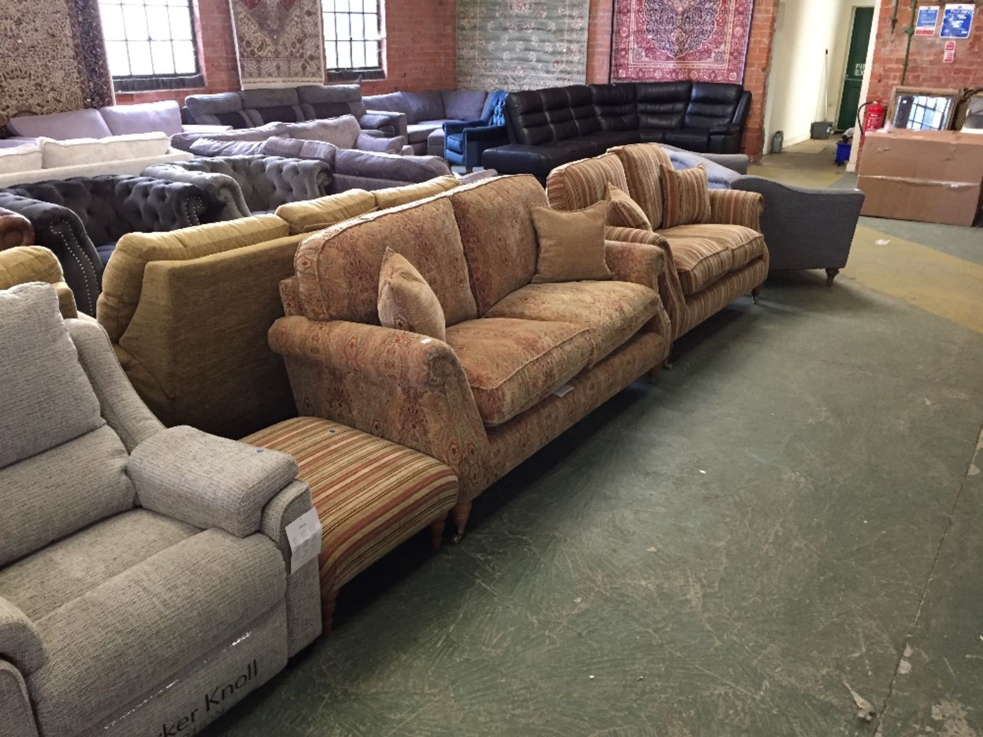 GOLDEN FLORAL PATTERENED 3 SEATER SOFA AND MULTI C(missing wheel on foot)