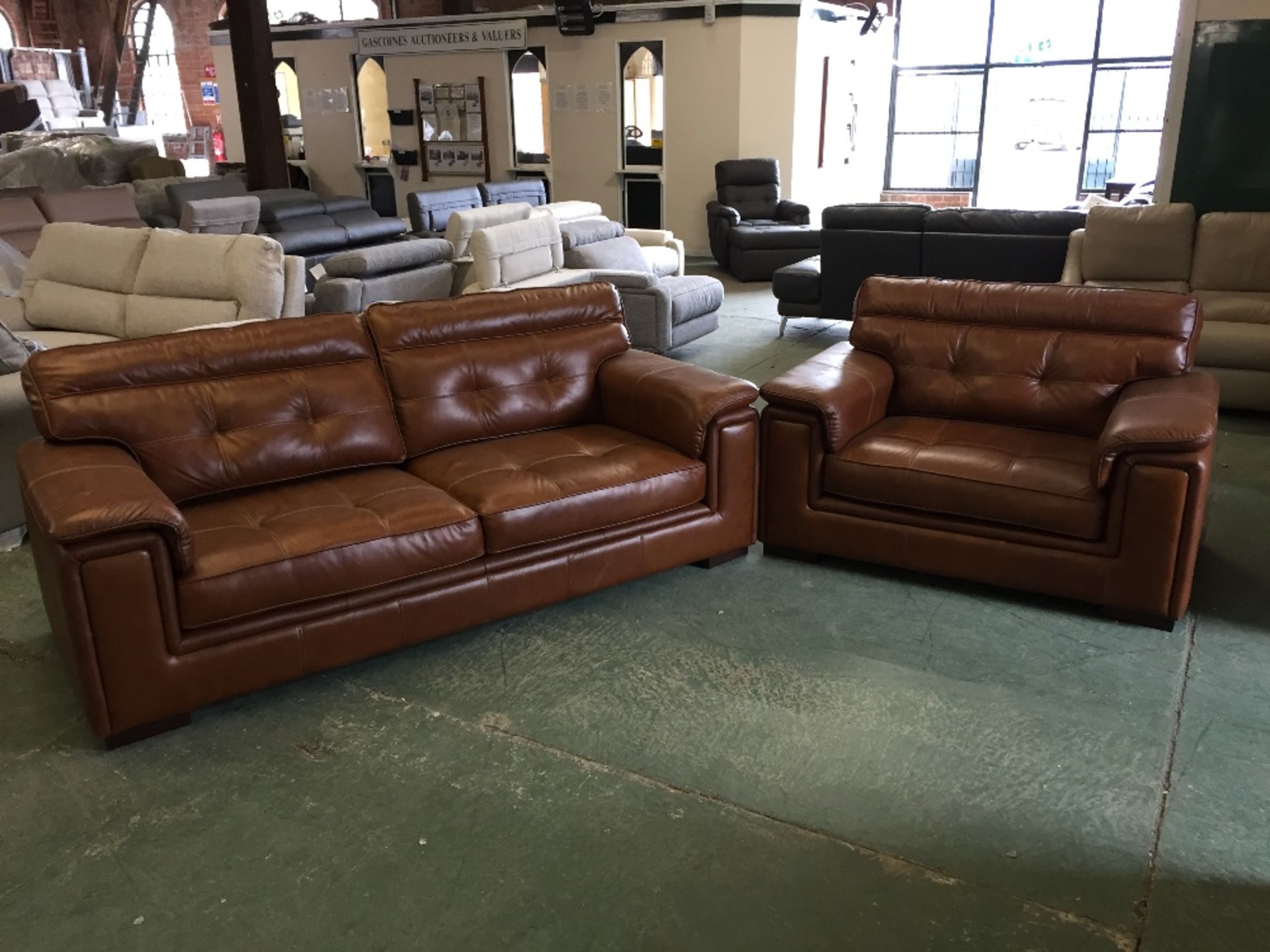 BROWN LEATHER WITH WHITE STITCHING 3 SEATER SOFA A