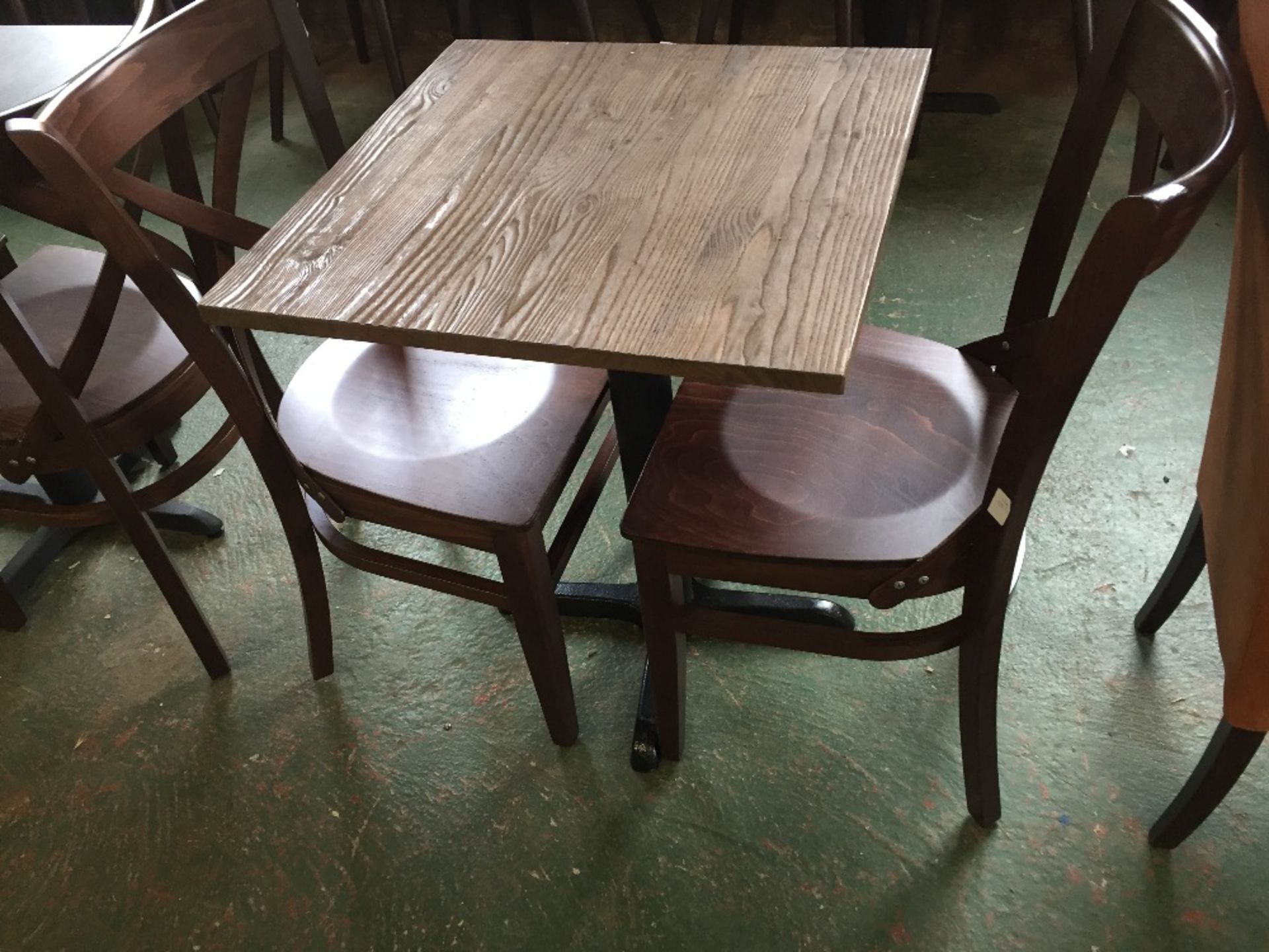 CAST IRON TABLE WITH WOODEN TOP AND 2 X WOODEN CHA