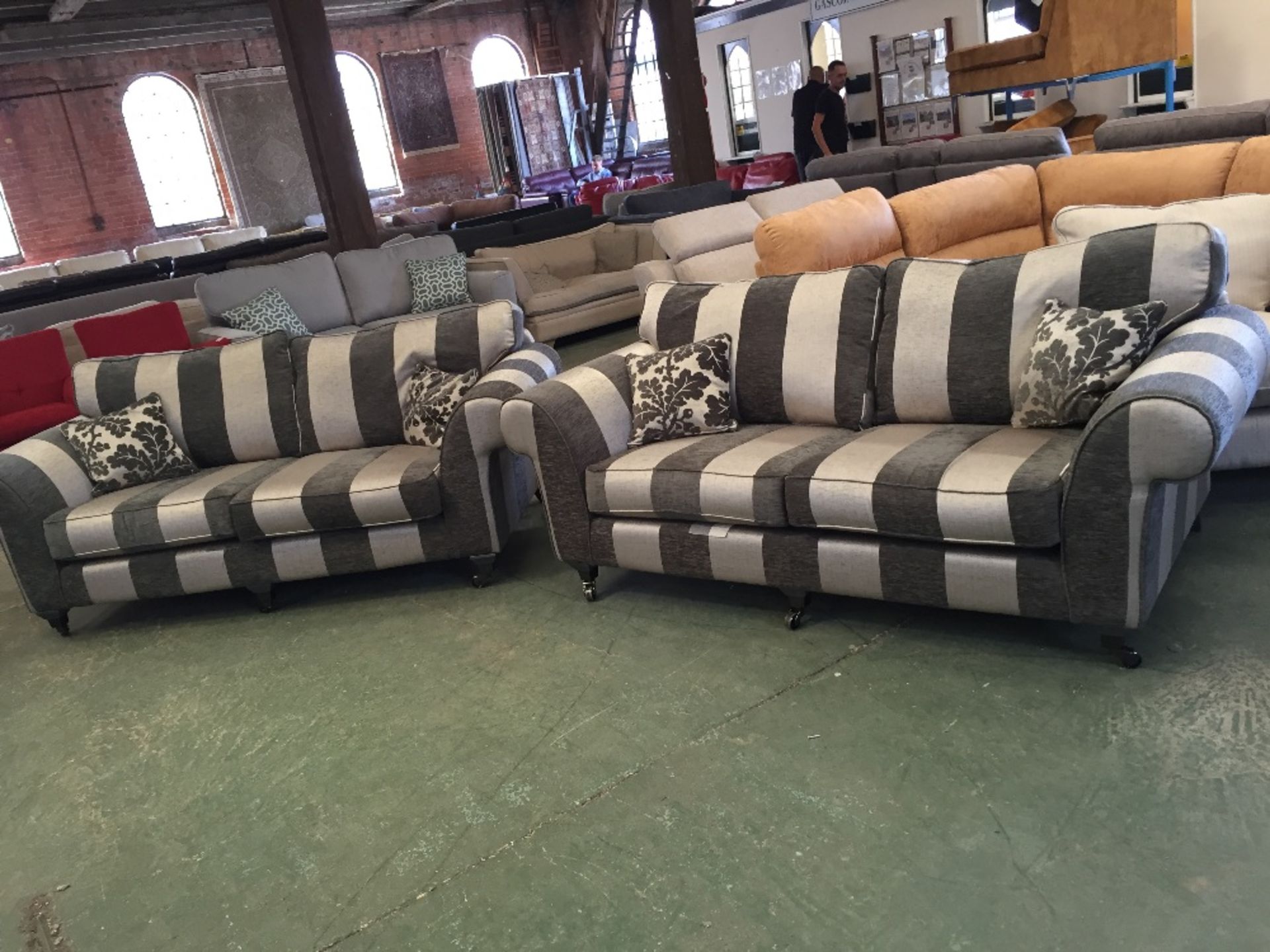2 X BLACK AND SILVER 2 AND A HALF SEATER SOFAS (31