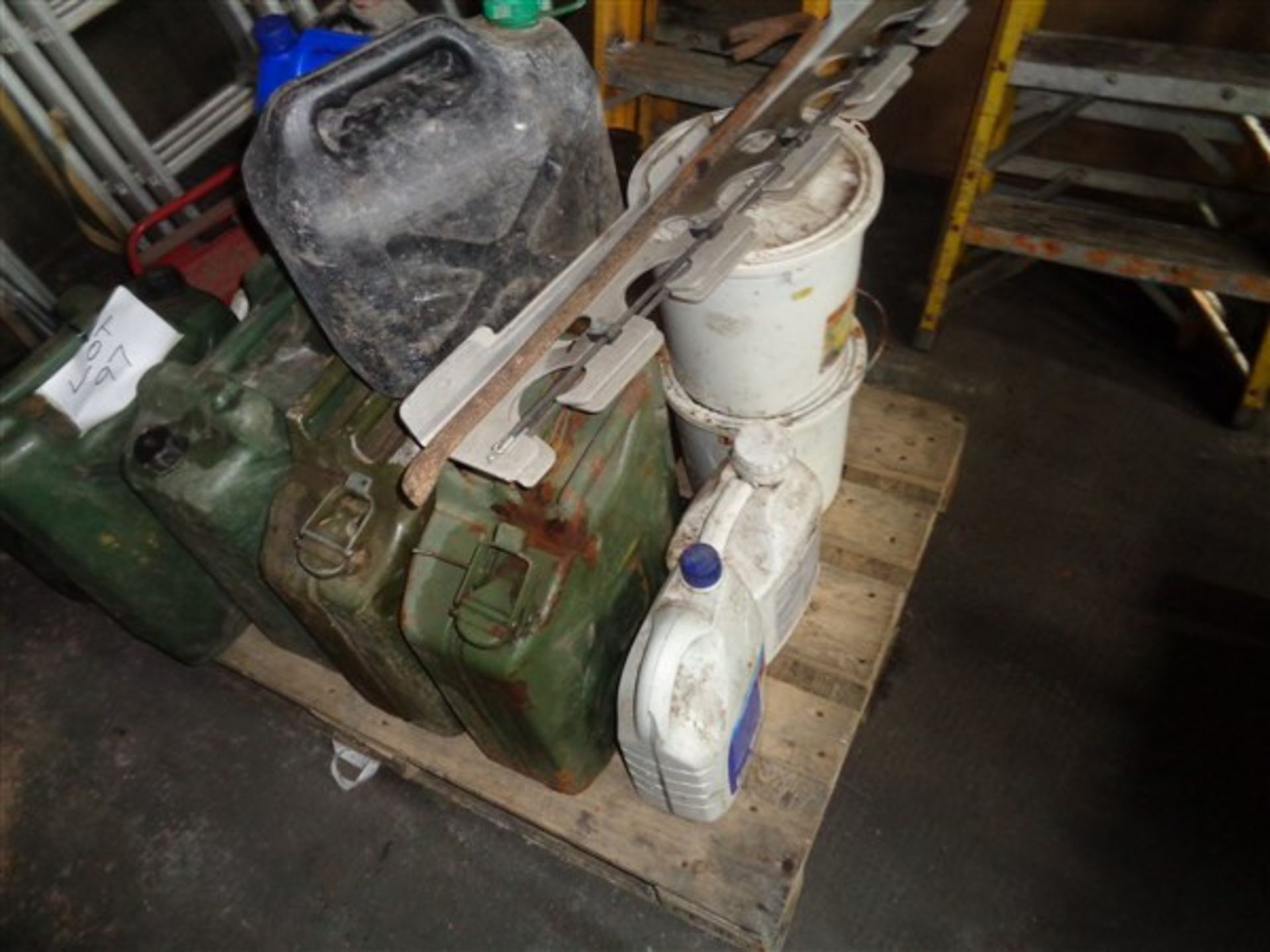 Pallet of jerry cans and tools