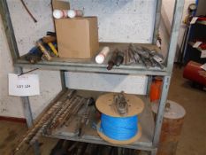 Quantity of drill and breaker bits to two shelves as lotted