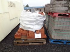 Part pallet and 2 bags of red facing brick