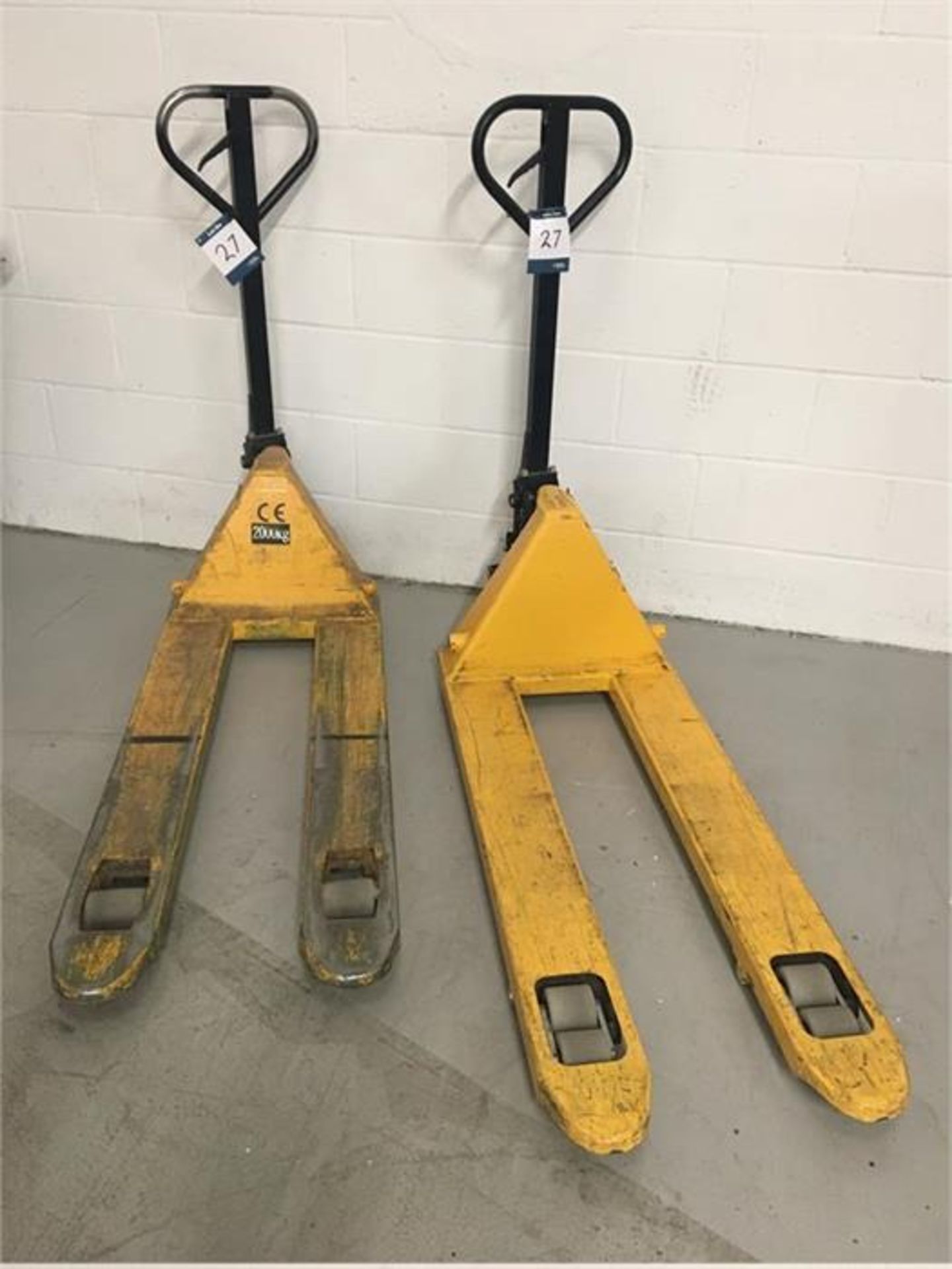 Two hydraulic pallet trucks (1 x 2,000kgs, 1 x 3,000kgs)