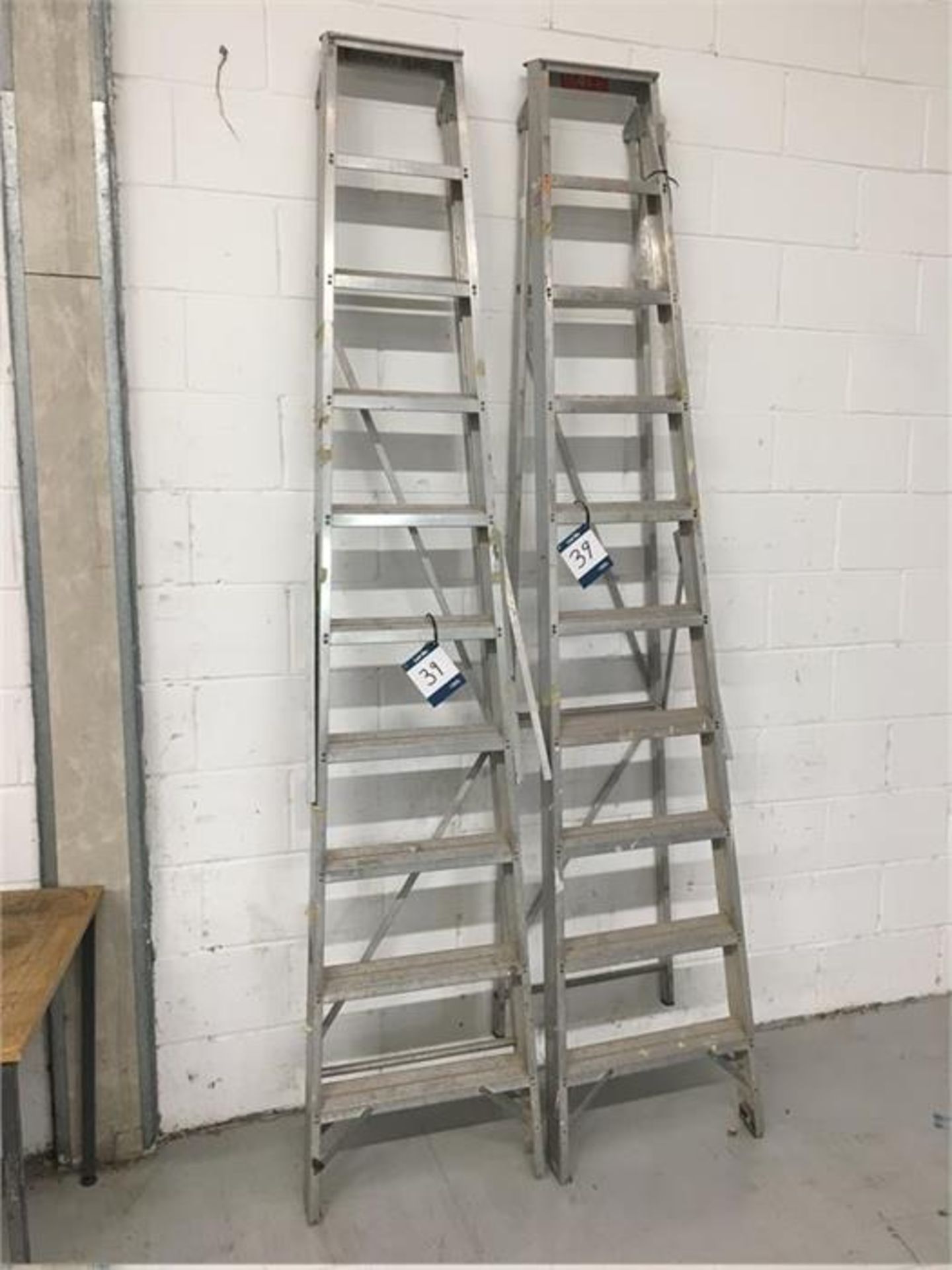 Pair of 10-tread A-frame ladders