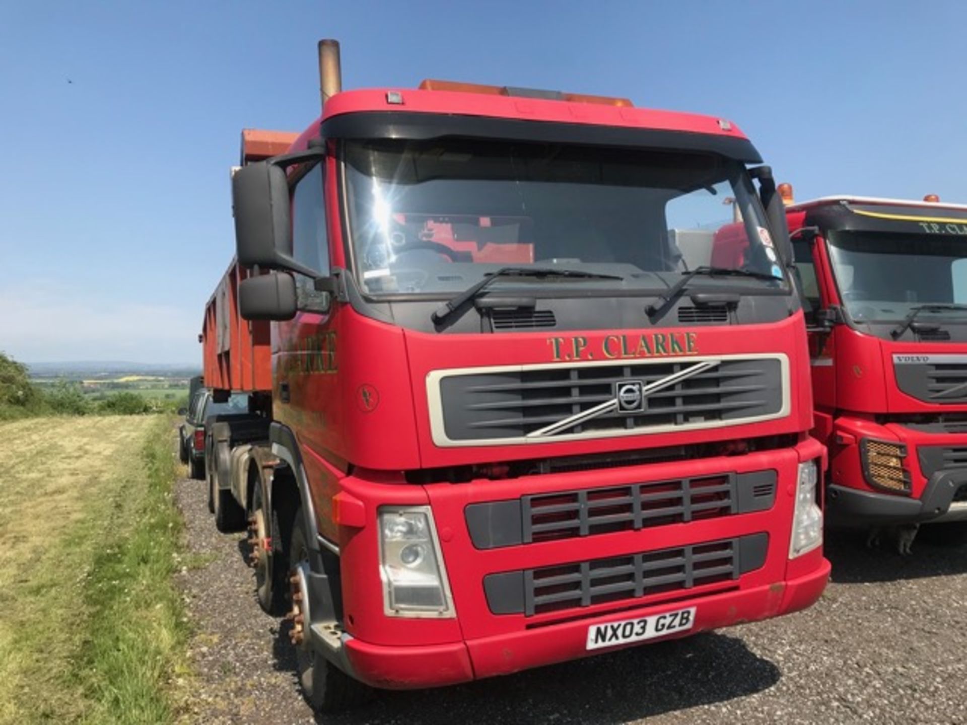 2003 Volvo FM12 84R hook loader, registration NX03GZB. 382,524 recorded Km