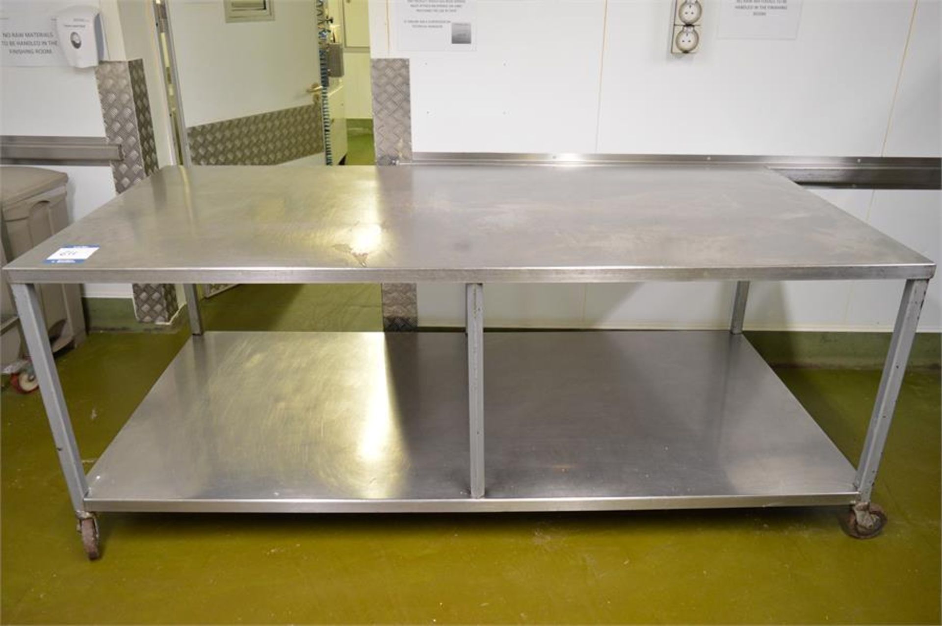 Stainless steel mobile prep table, 2.37m (w) x 1.15m (d) x 0.91m (h) (Located at Continental