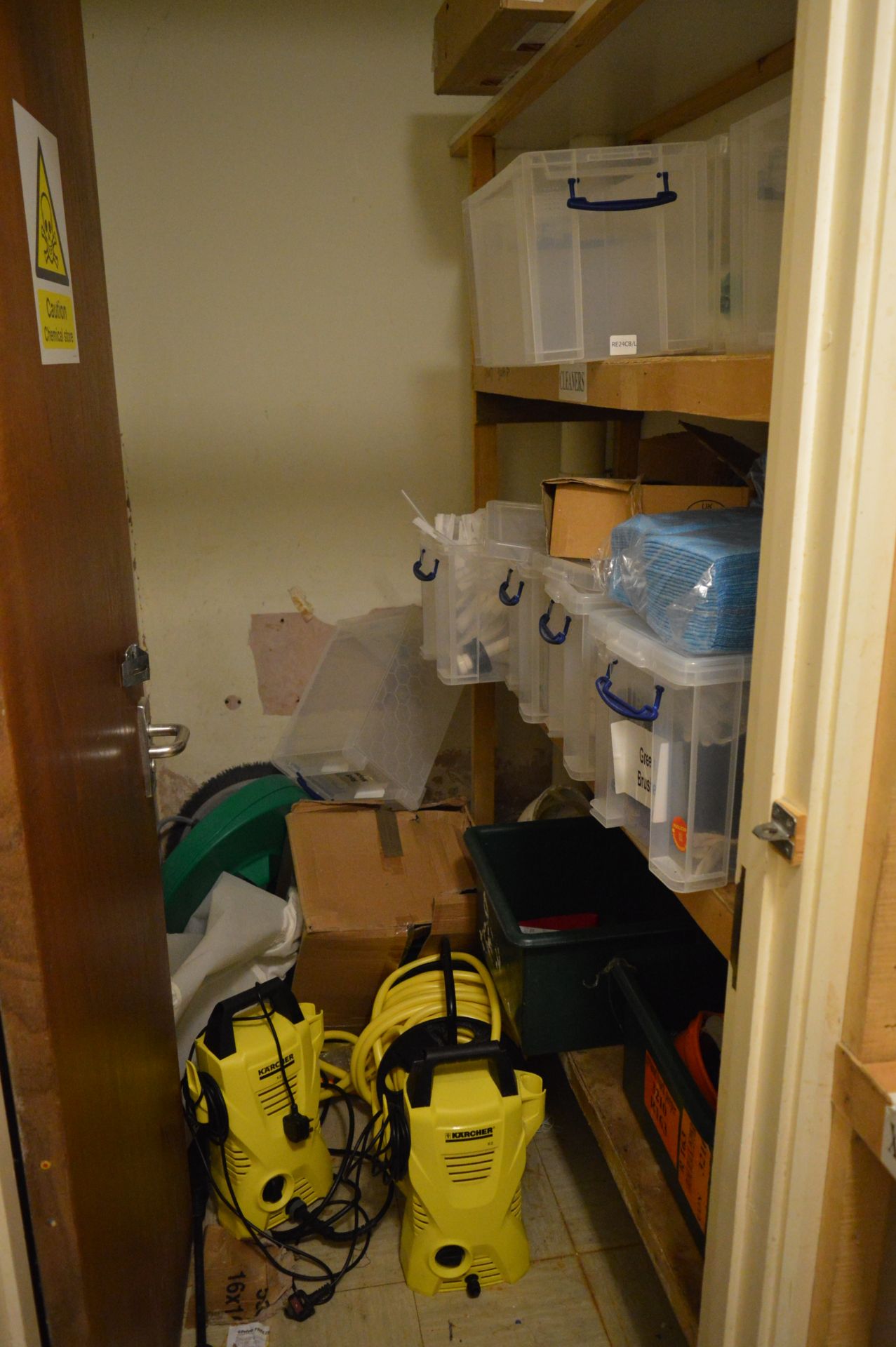 Contents of cleaners cupboard including 2 - Karcher K2 pressure washers, hose and reel, storage