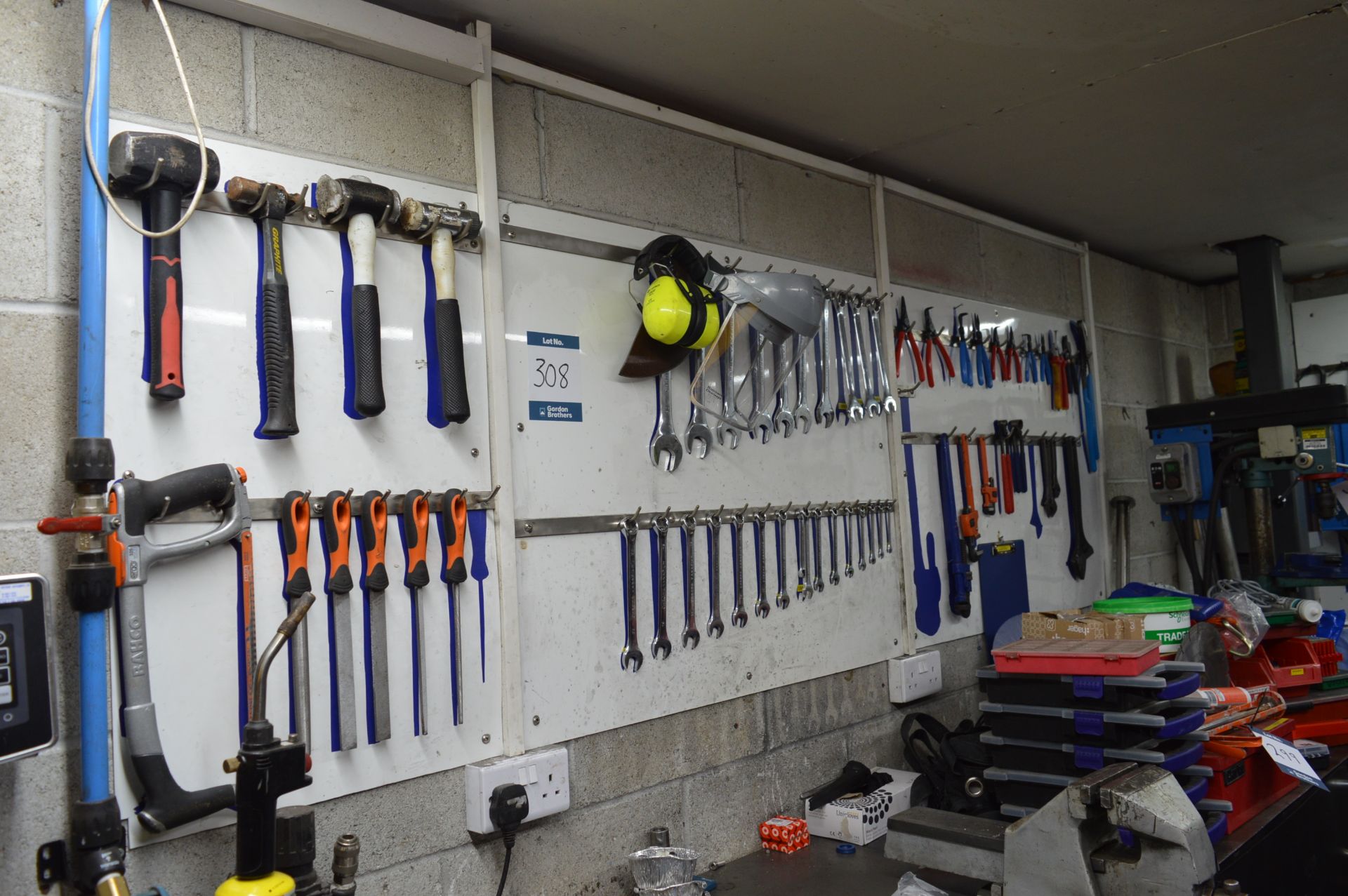 Assorted small hand tools including spanners, files, wrench, grips, hammers, etc (Located at