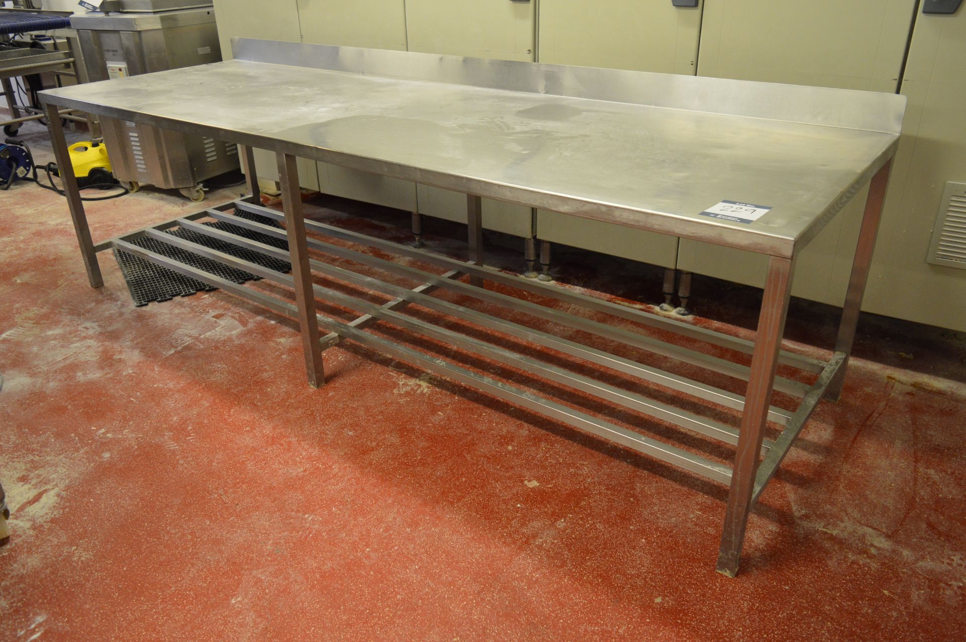 Stainless steel work bench with storage, 2.8m (w) x 0.90m (d) x 0.82m (h) (Located at Crantock