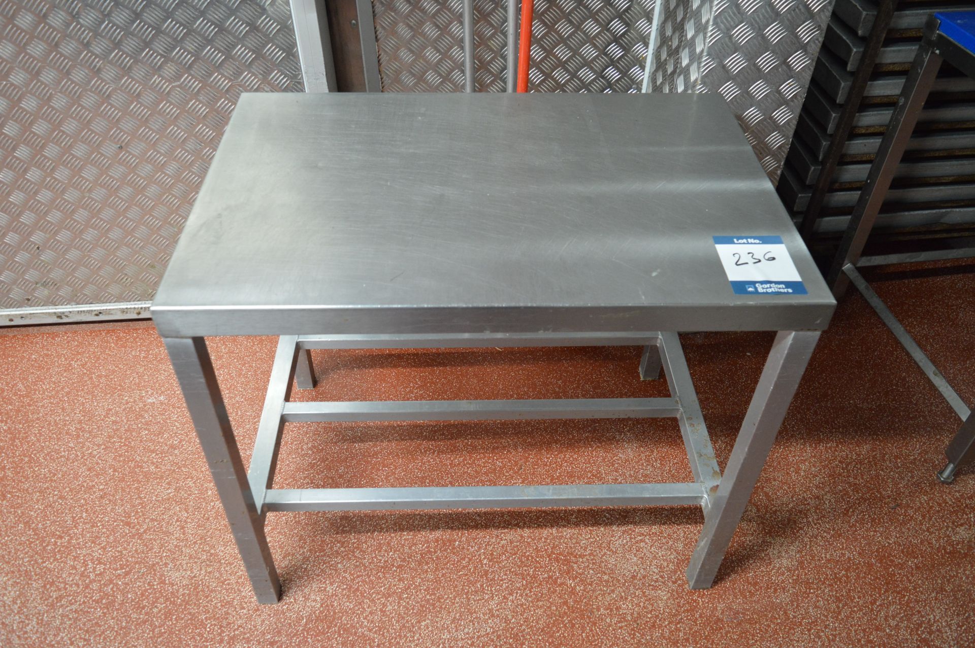 Stainless steel work bench, 0.90m (w) x 0.60m (d) x 0.77m (h) (Located at Crantock Bakery, Newquay)