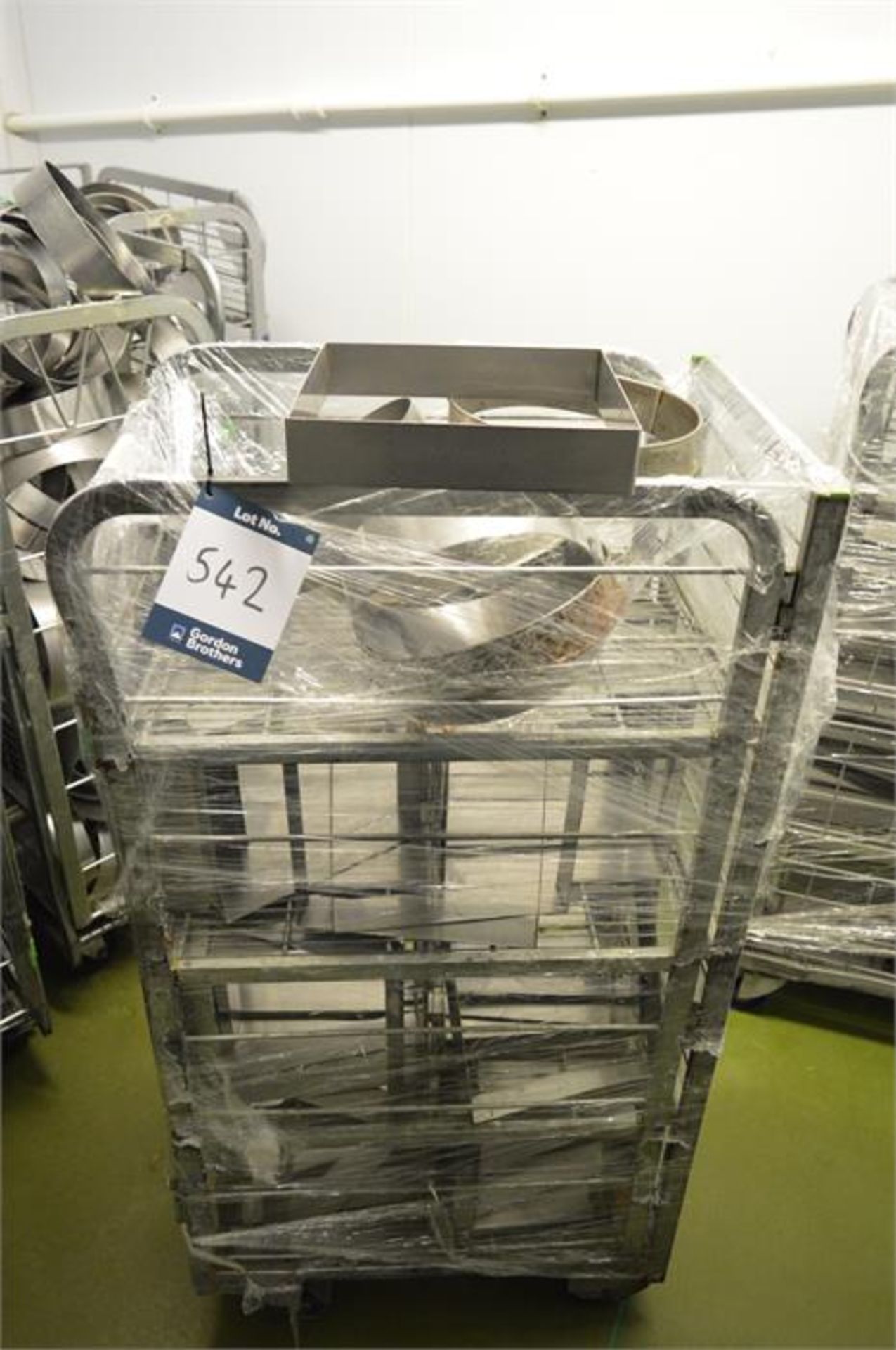 Mobile cage with stainless steel square/circular moulds, as lotted (Located at Continental