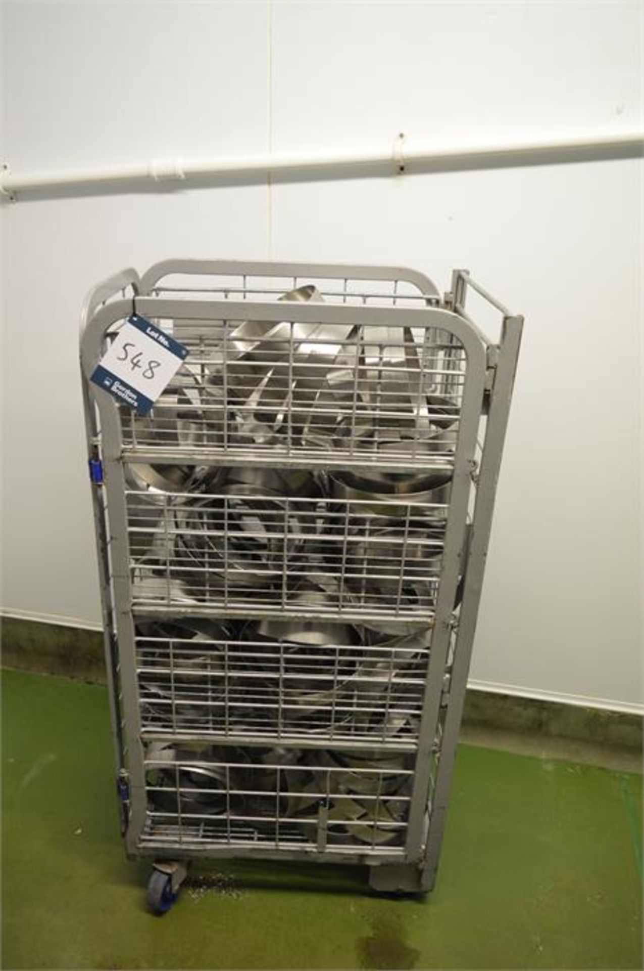 Mobile cage with stainless steel circular moulds, as lotted (Located at Continental Patisserie,