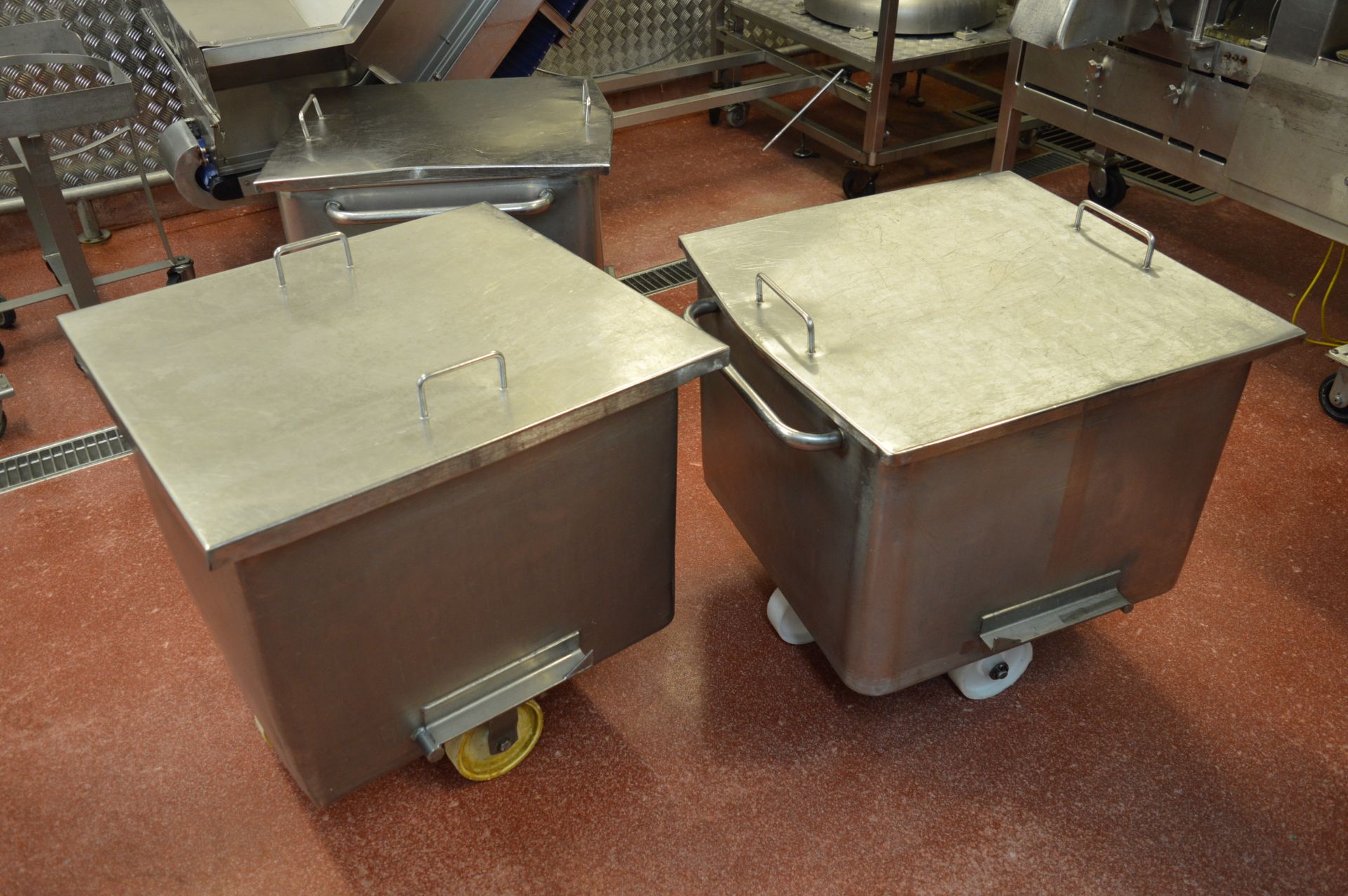 4 x mobile stainless steel flour bins with lids (Located at Crantock Bakery, Newquay)