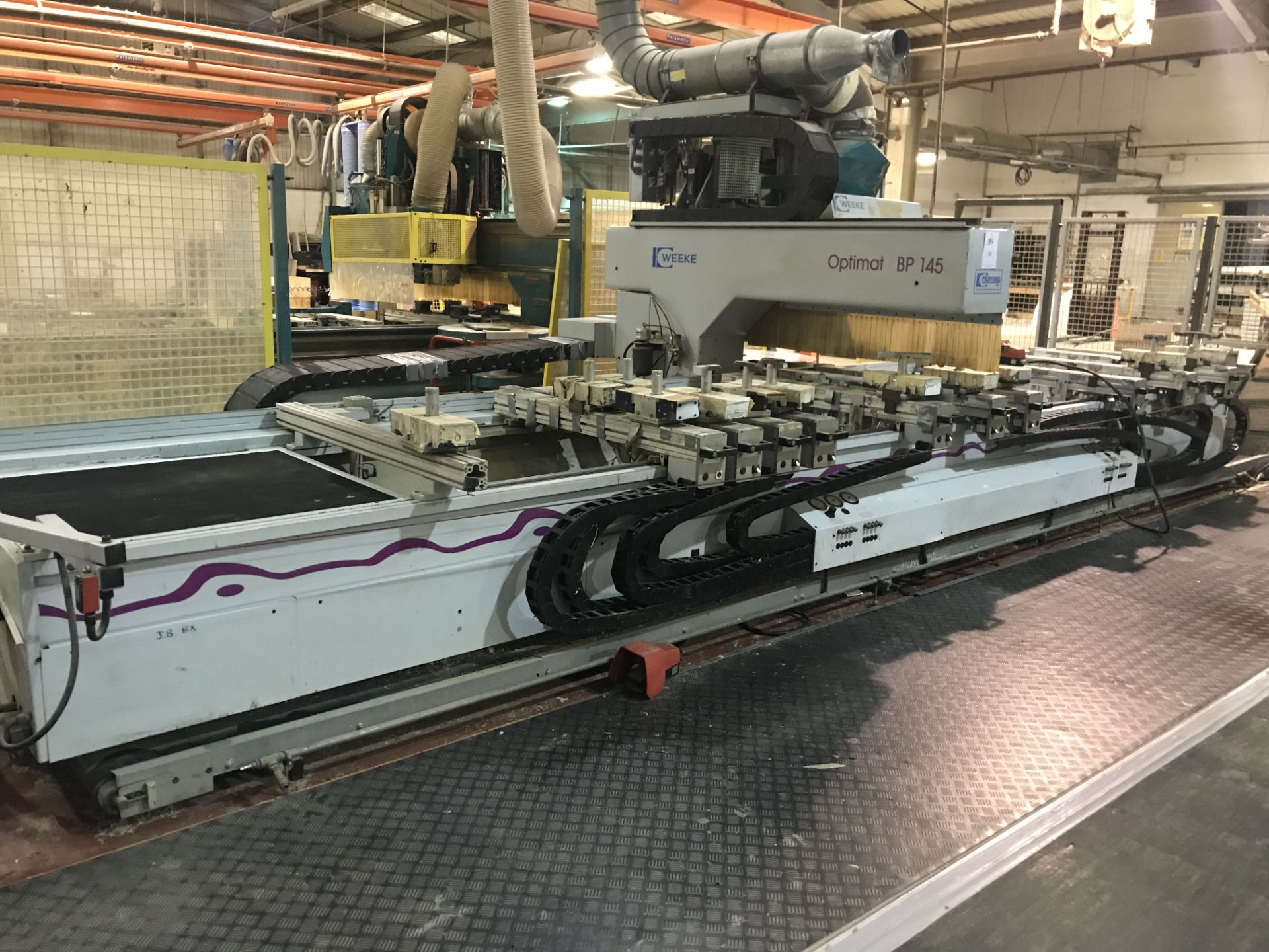 Weeke, model number Optimat BP145 CNC 5 axis router c/w 6m bed, 18 ATC, waste conveyor & PLC