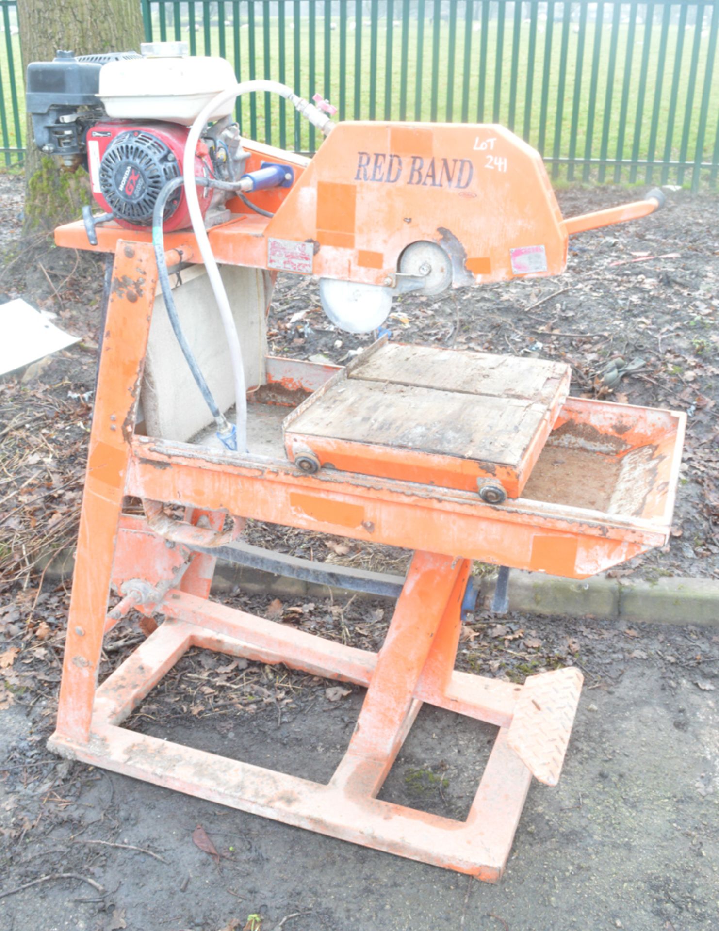 Red Band petrol driven masonry saw