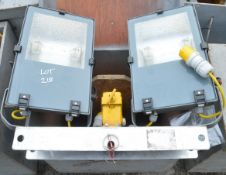 Pair of 110v flood lights c/w box A605785