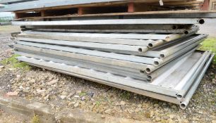 Approximately 16 steel temporary fence panels