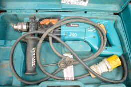 Makita 110v hammer drill c/w carry case A620984