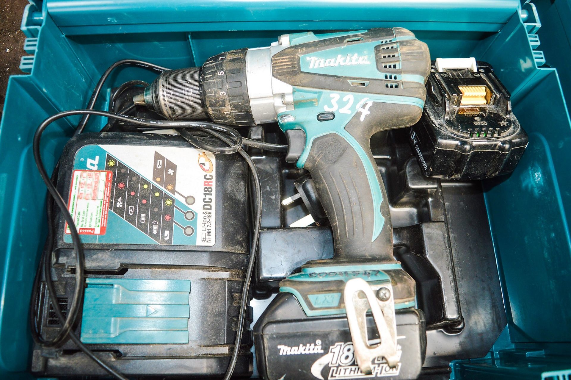 Makita 18v cordless power drill c/w charger, 2 batteries & carry case E0011547