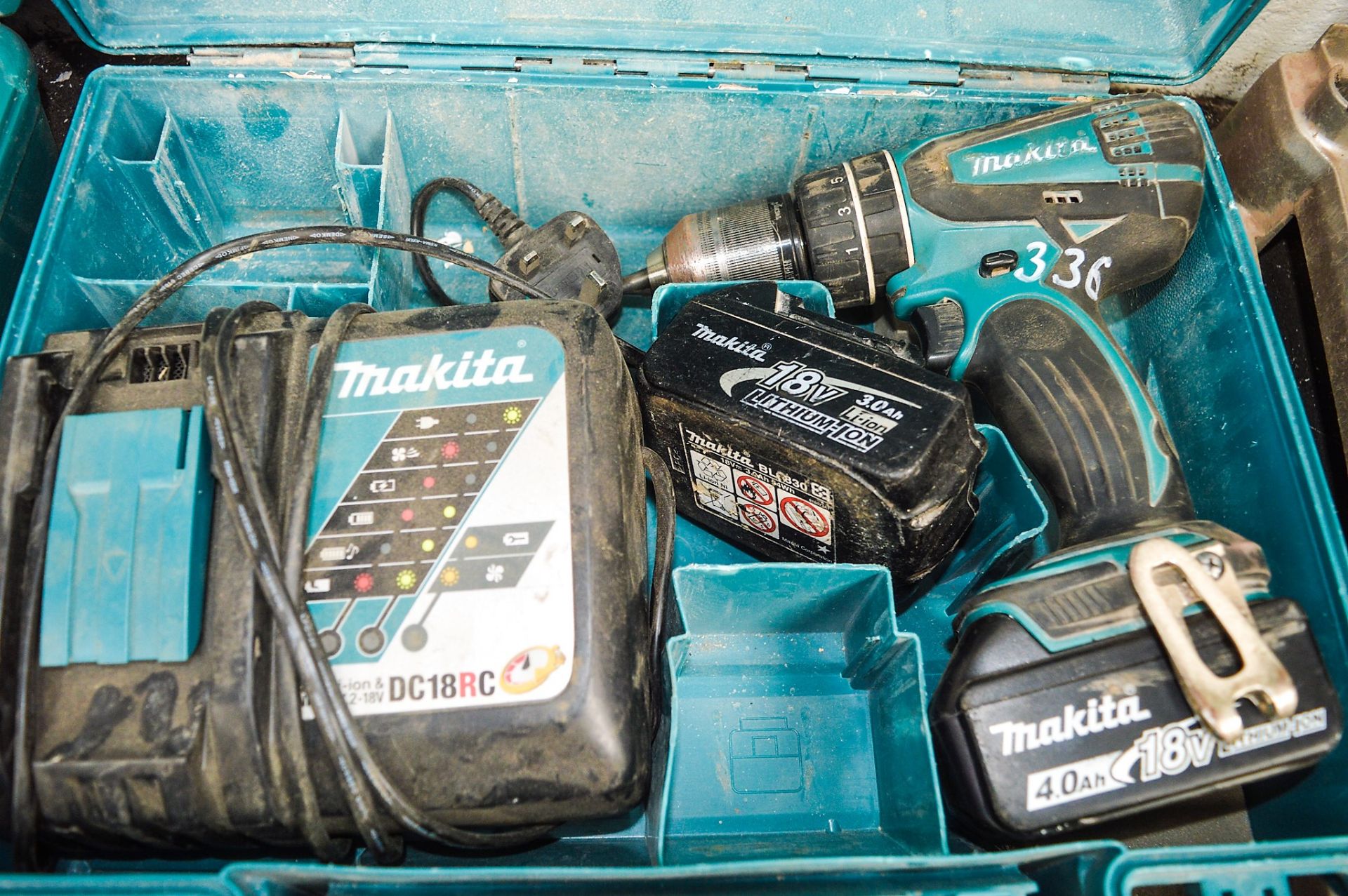 Makita 18v cordless power drill c/w charger, 2 batteries & carry case A597381