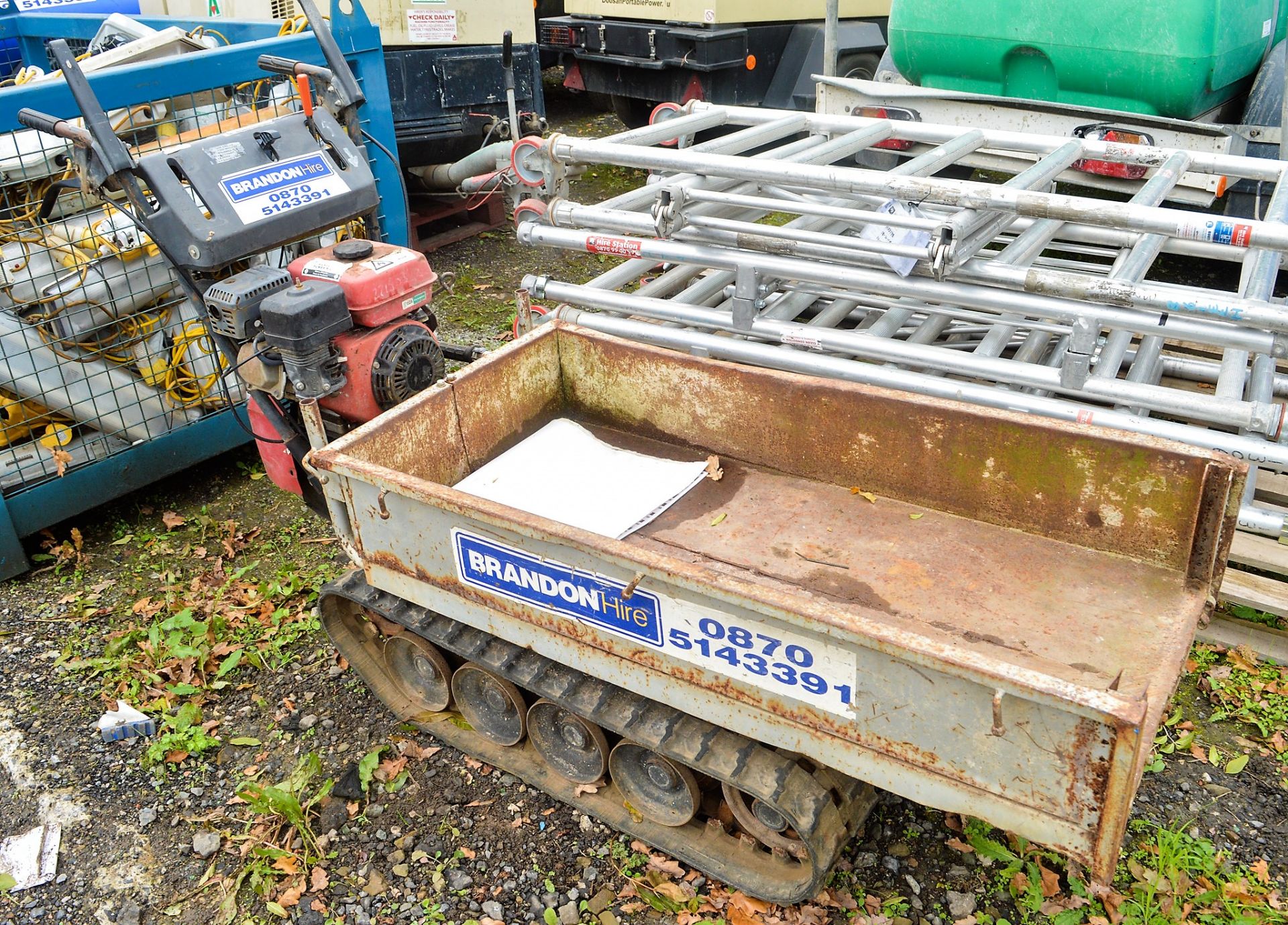 Petrol driven walk behind tracked carrier