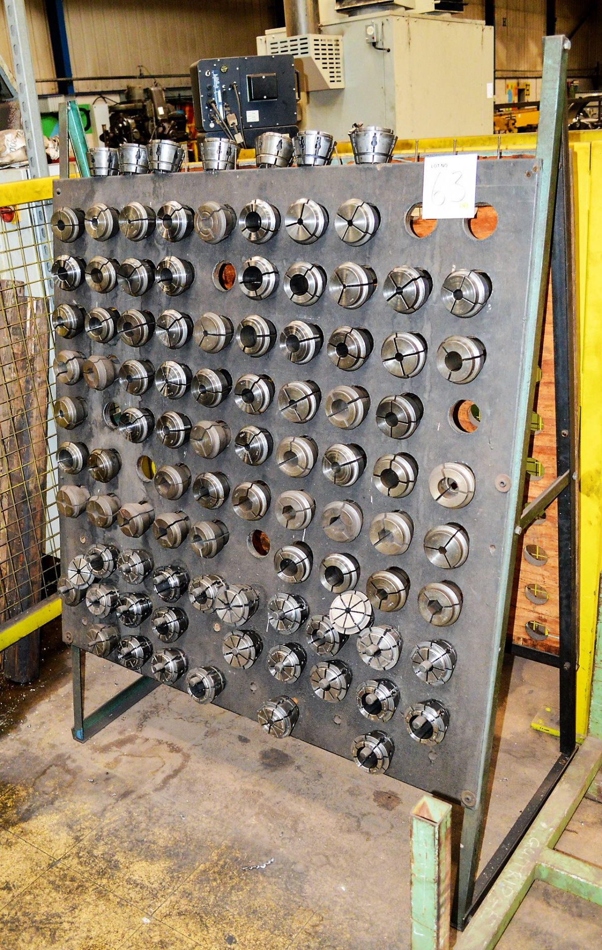 Steel rack & contents of collets & tooling as lotted