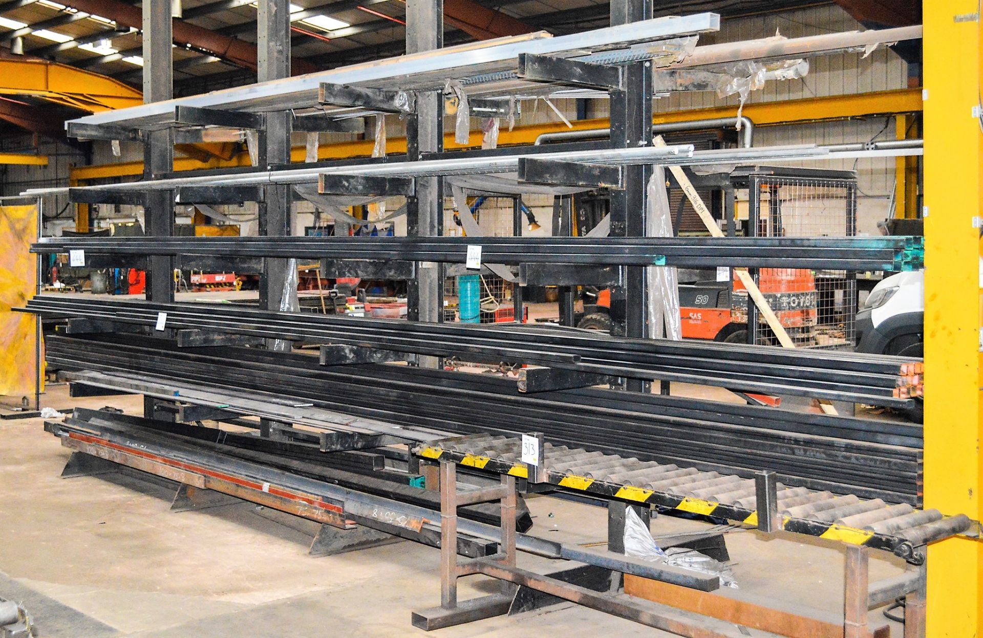 Double sided steel stock rack & contents of steel box section, flat bar, tube & stainless box as